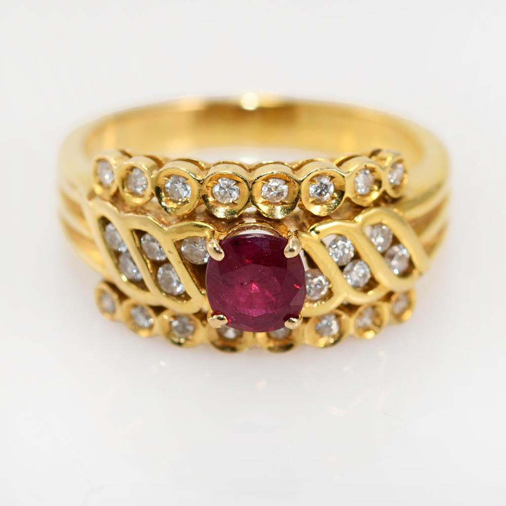 18k Yellow Gold Ruby and Diamond Ring.
The Ruby is natural, 50ct. 
There is .25tdw in Round Brlliant Cut Diamonds.
Clarity SI1-SI2, Color G-H-I.
Stamped 750, weighs 4.9gr
Size 6.
Can be sized up or down one size for additional fee.