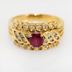 Bague en or jaune 18k rubis et diamant .75tcw 4.9gr