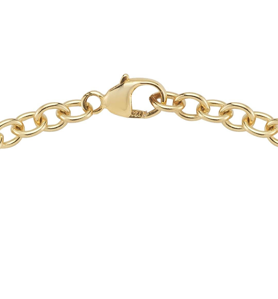 Gold bracelet hand set with rubies. The setting is painted with black rhodium which makes the rubies really glow.

18k yellow gold 
0.30 cts of rubies 
6