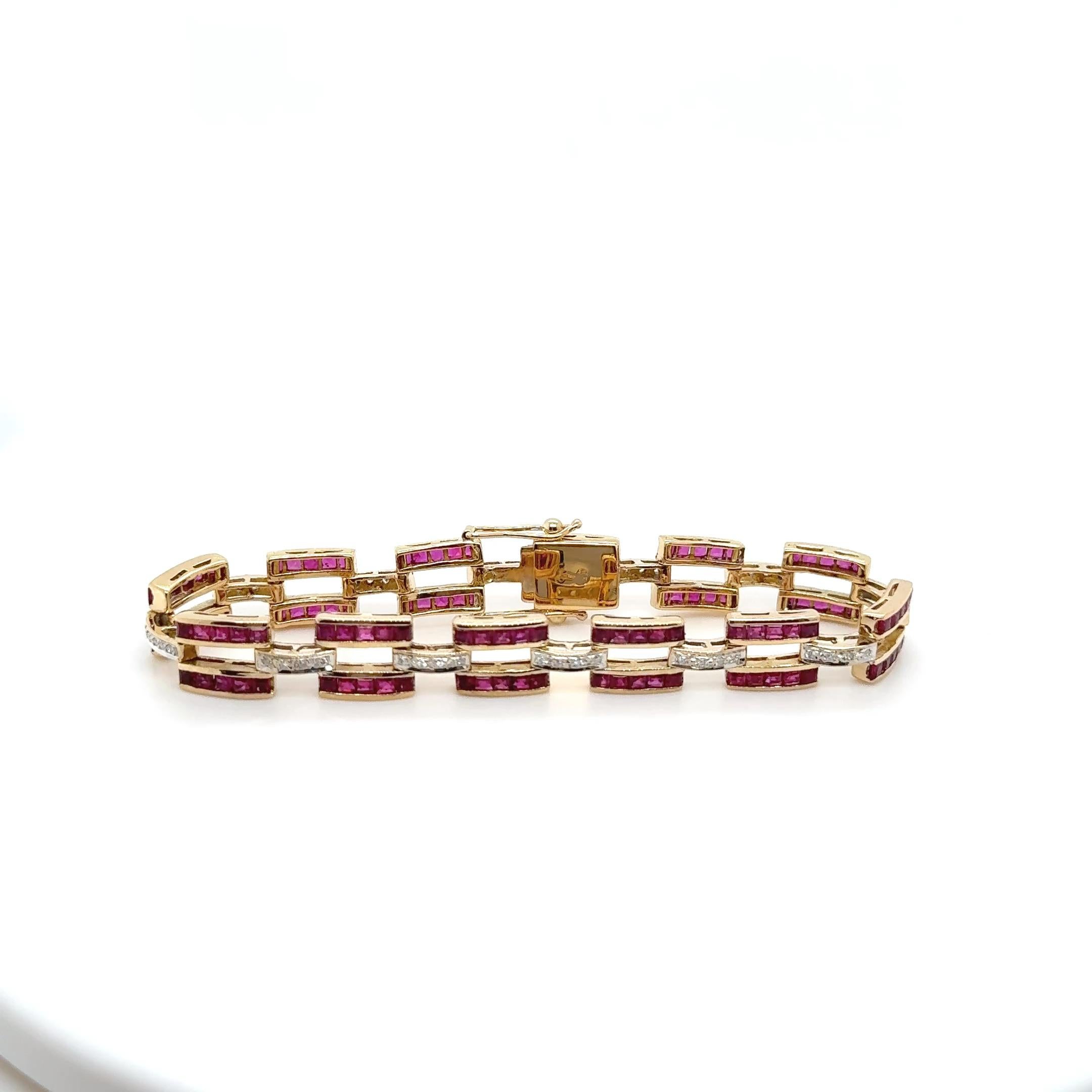 This spectacular 18 karat yellow gold bracelet featuring 120 square cut rubies totaling 6 carats accented by 48 round cut diamonds with SI clarity diamonds and H color diamonds totaling 0.24 carats with width approximately 8.6mm measuring 7 inches