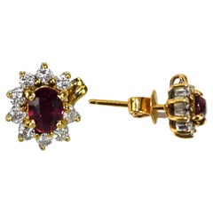 Boucles d'oreilles en or jaune 18K avec rubis et diamants 5.1g