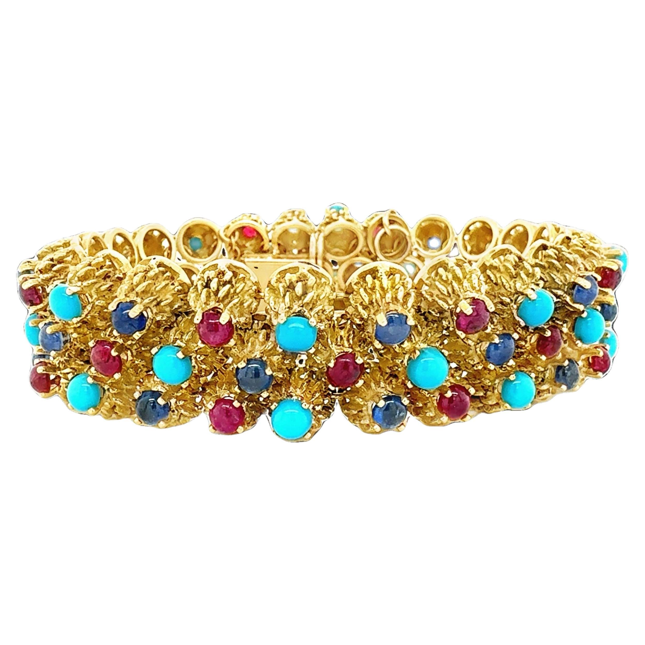 Armband aus 18 Karat Gelbgold mit Rubin, Saphir und Türkis