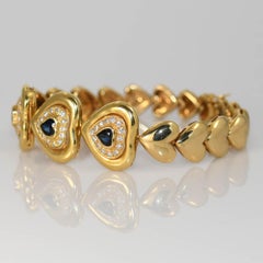 Bracciale a forma di cuore con zaffiri e diamanti in oro giallo 18k, 29g
