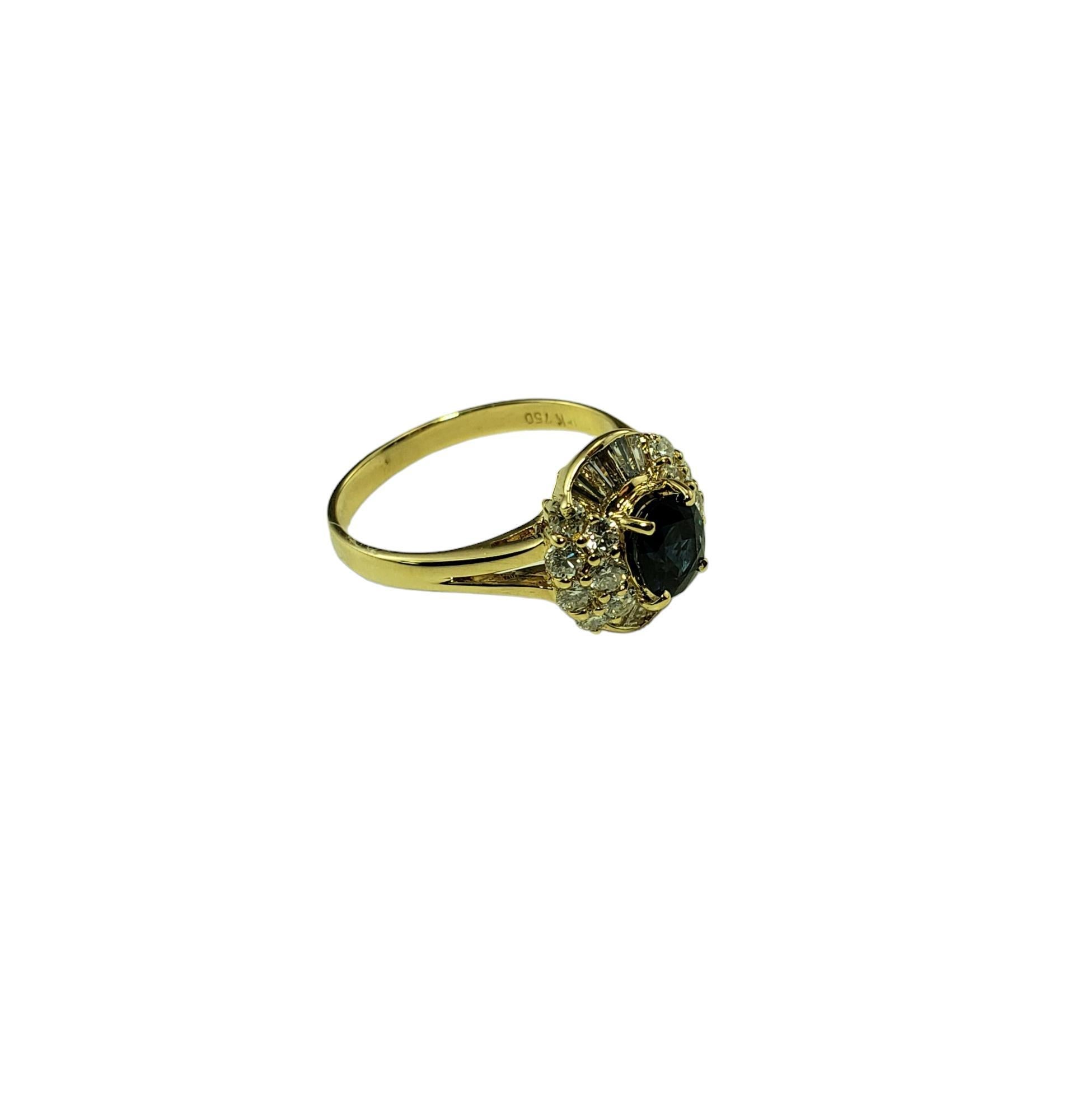 Vintage 18K Yellow Gold Sapphire and Diamond Ring Size 7.5 JAGi Certified-

This stunning ring features one oval sapphire (6.1 mm x 5.1 mm), 8 baguette cut diamonds and 14 round brilliant cut diamonds set in classic 18K yellow gold.  Width: 12 mm. 