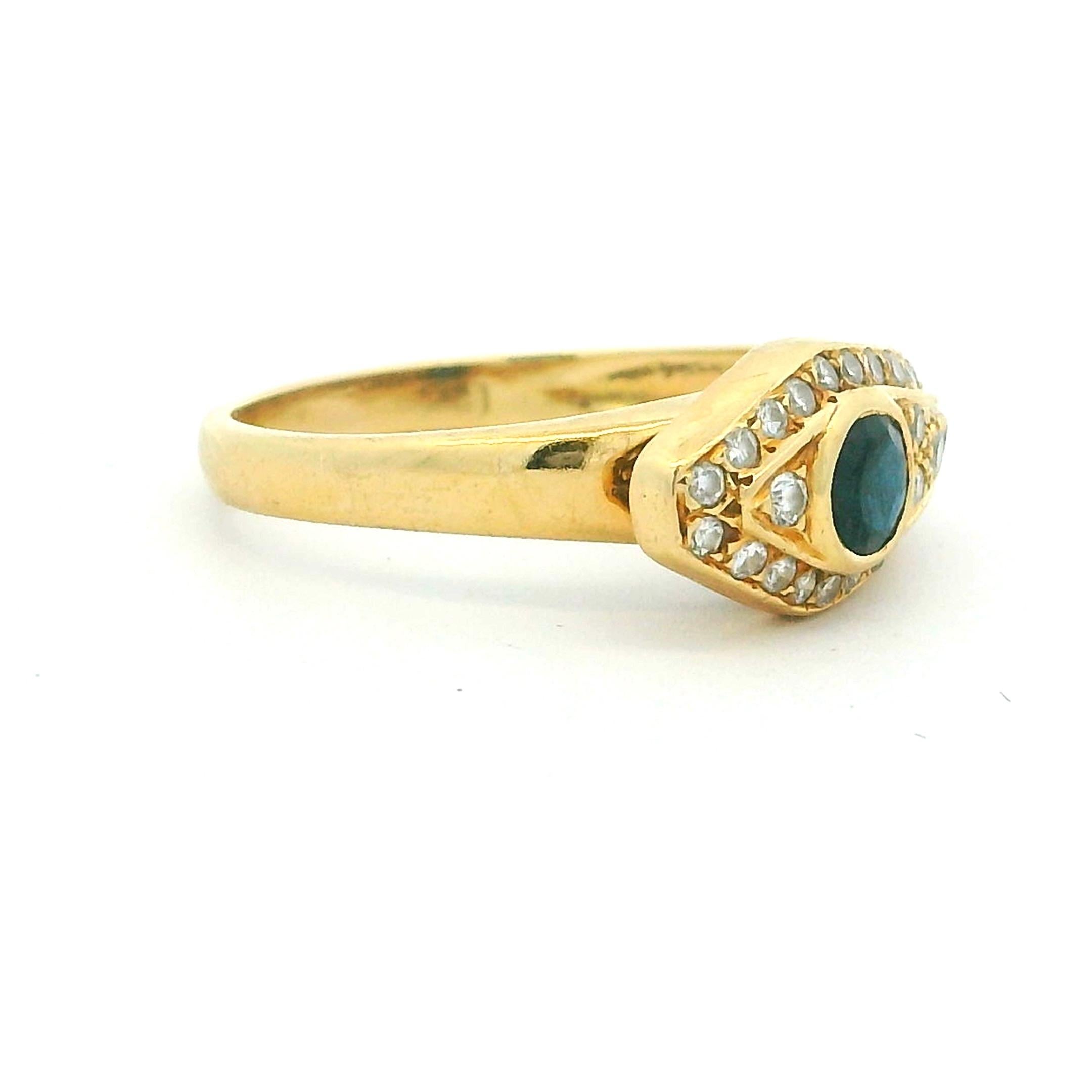 Anello a serpente con zaffiro e diamante in oro giallo 18 carati, motivo del malocchio In condizioni ottime a Miami, FL