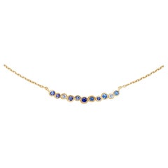 Collana a cascata media in oro giallo 18k con zaffiro e acquamarina