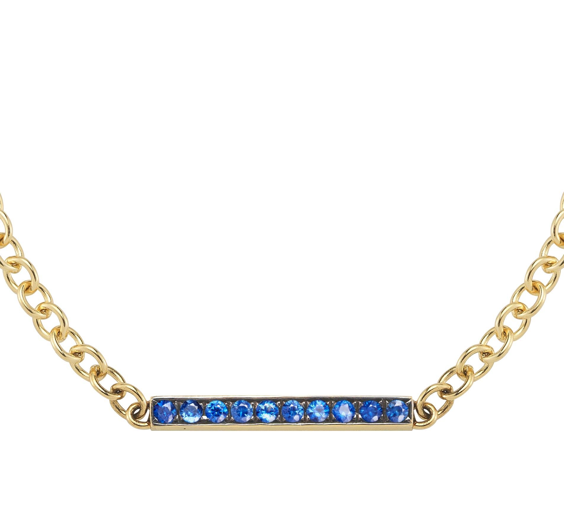Gold bracelet hand set with sapphire. The setting is painted with black rhodium which makes the sapphires really glow.

18k yellow gold 
0.30 cts of sapphire 
6