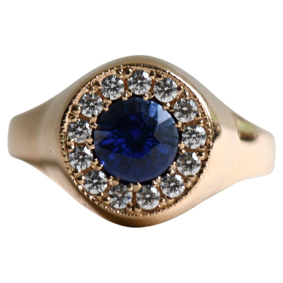 Anello aureola con zaffiro e diamante in oro giallo 18K