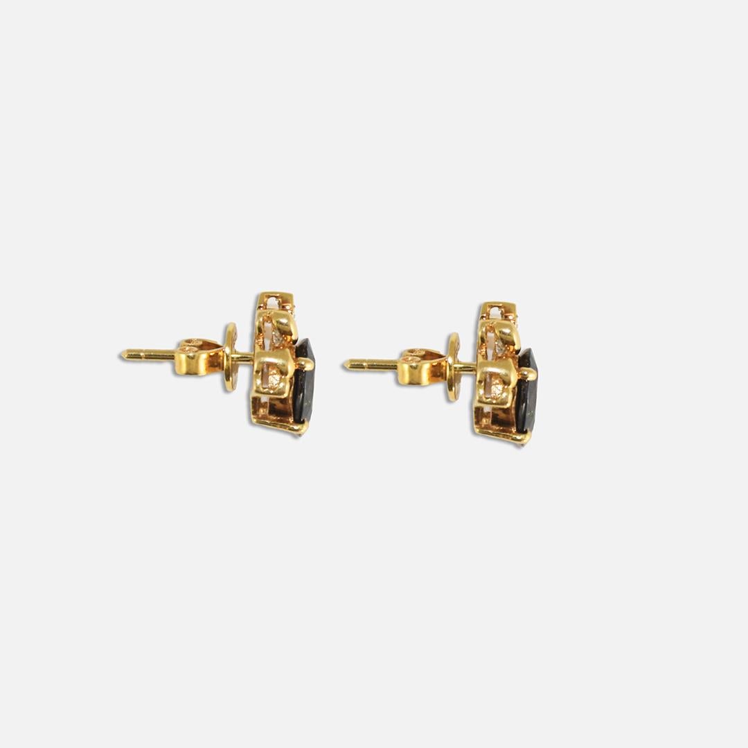 Ladies 18k yellow gold, sapphire, and diamond earrings. 
The settings are stamped 750. 
The earrings weigh 3.8 grams gross weight.
Dark blue oval sapphires, 2.50 total carats. 
There are small round side diamonds, .03 total carats, and good quality.