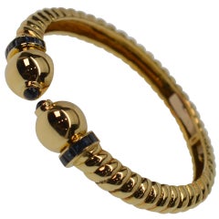 18K Yellow Gold 
Sapphire Hinged Cuff Bracelet