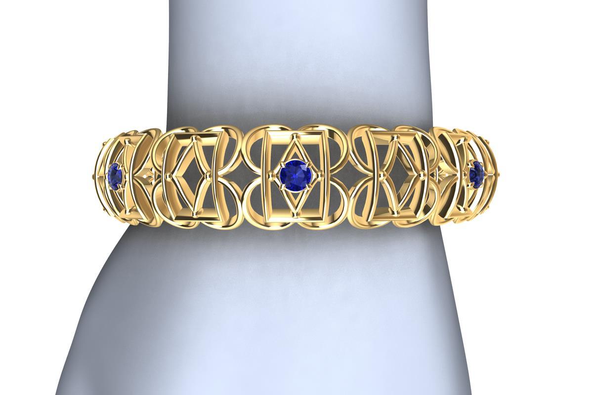 18k Yellow Gold Sapphire Rectangle Rhombus Bangle, from the Gates series. This bracelet is inspired from hand wrought ironwork off balconies, windows, and gates in Europe. A modern twist with 7 Ceylon color diamond cut sapphires,  2.8 carats  Made