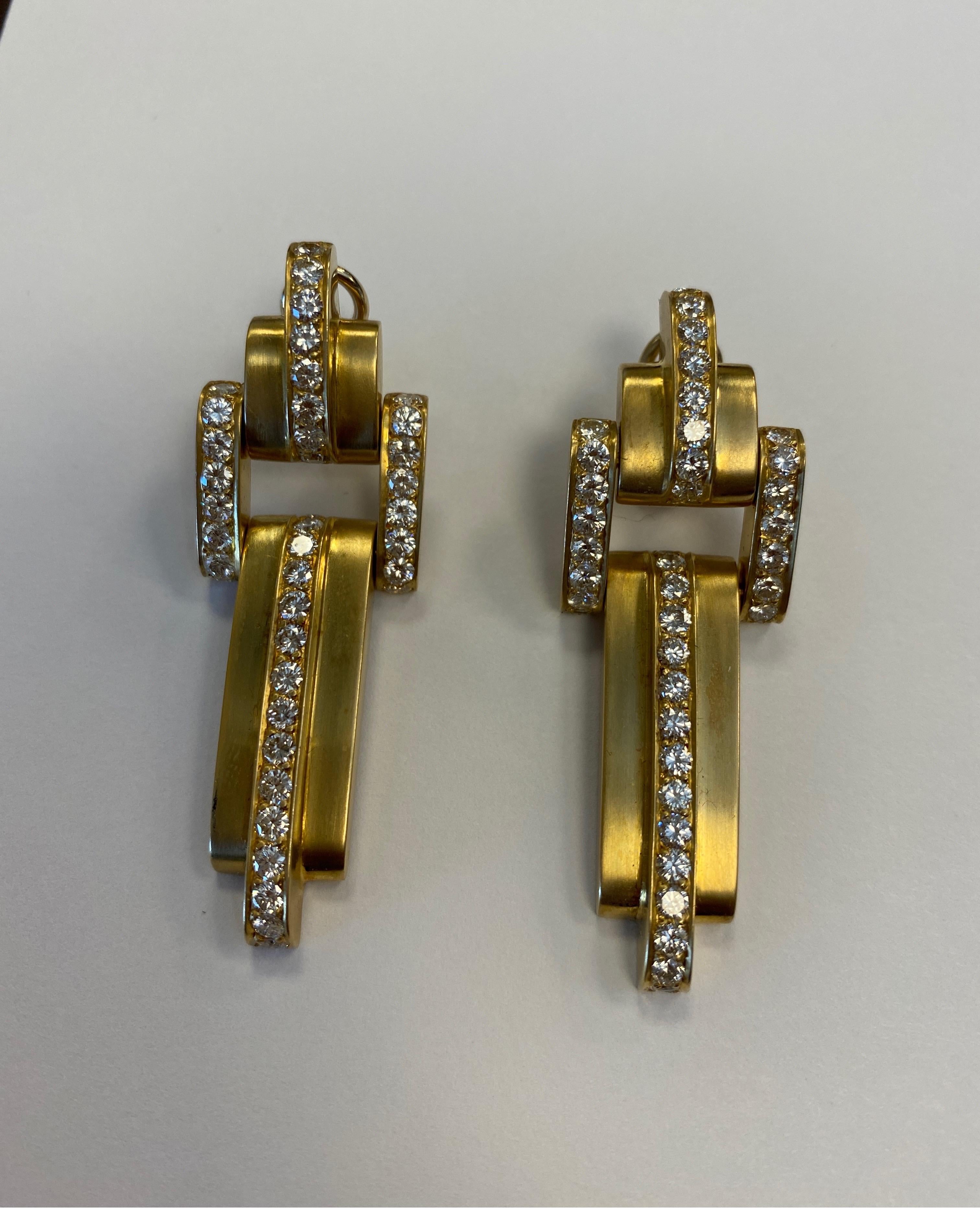 Contemporary 18 Karat Yellow Gold Satin Finish, Flexible Diamond Drop Earrings For Sale