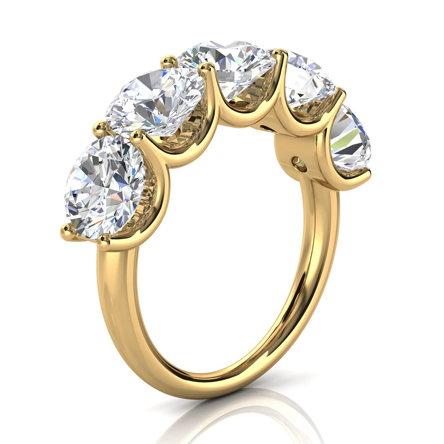 This ring features five(5) floating Brilliante round diamonds set in 