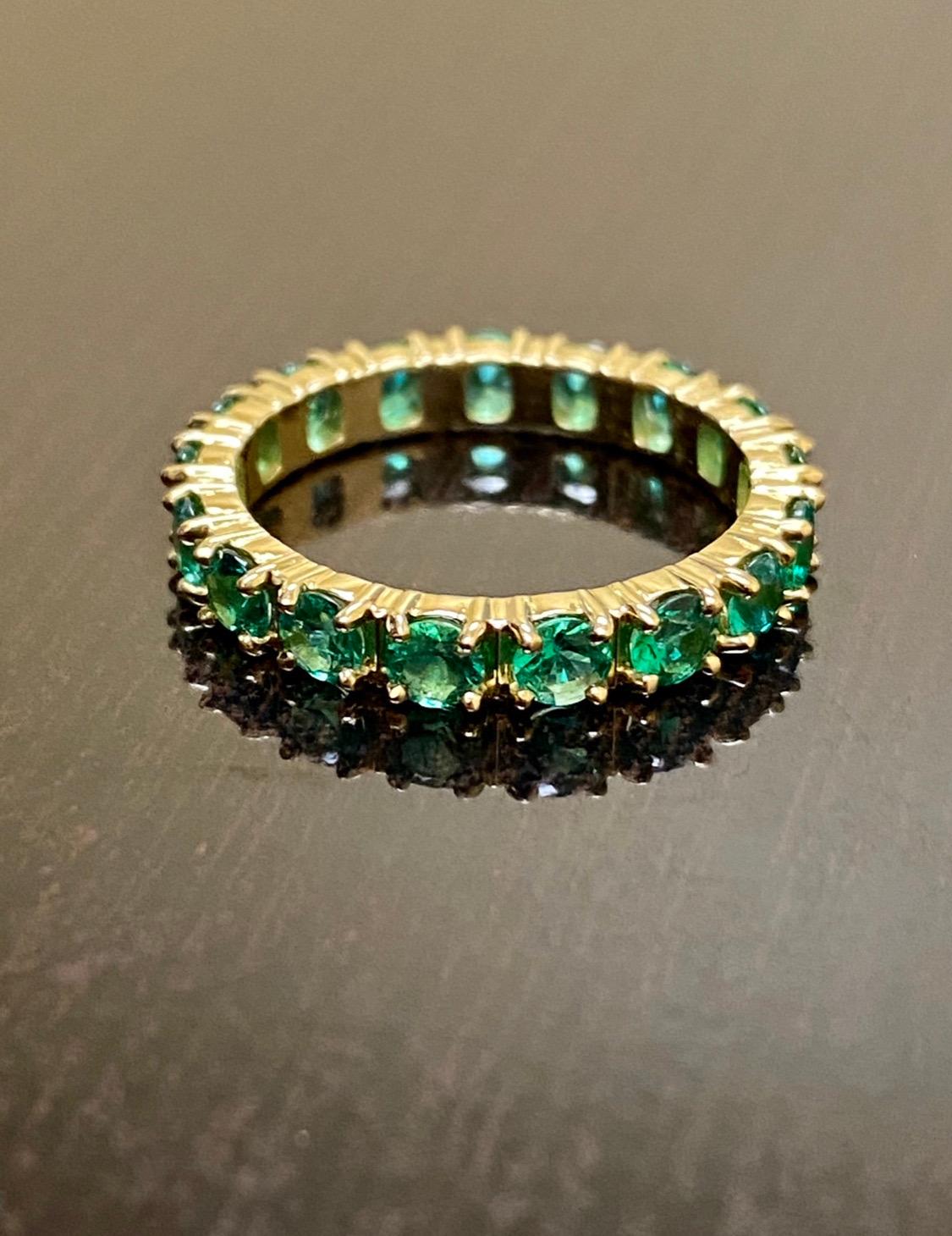 DeKara Designs Collection

Metal- 18K Yellow Gold, .750.

Stones- Genuine Round Emeralds, 3 MM Each, 1.60-1.80 Carats. Carat weight depends on finger size.

Handmade Gorgeous Genuine Emerald Eternity Engagement Band Created in 18K Yellow Gold. This