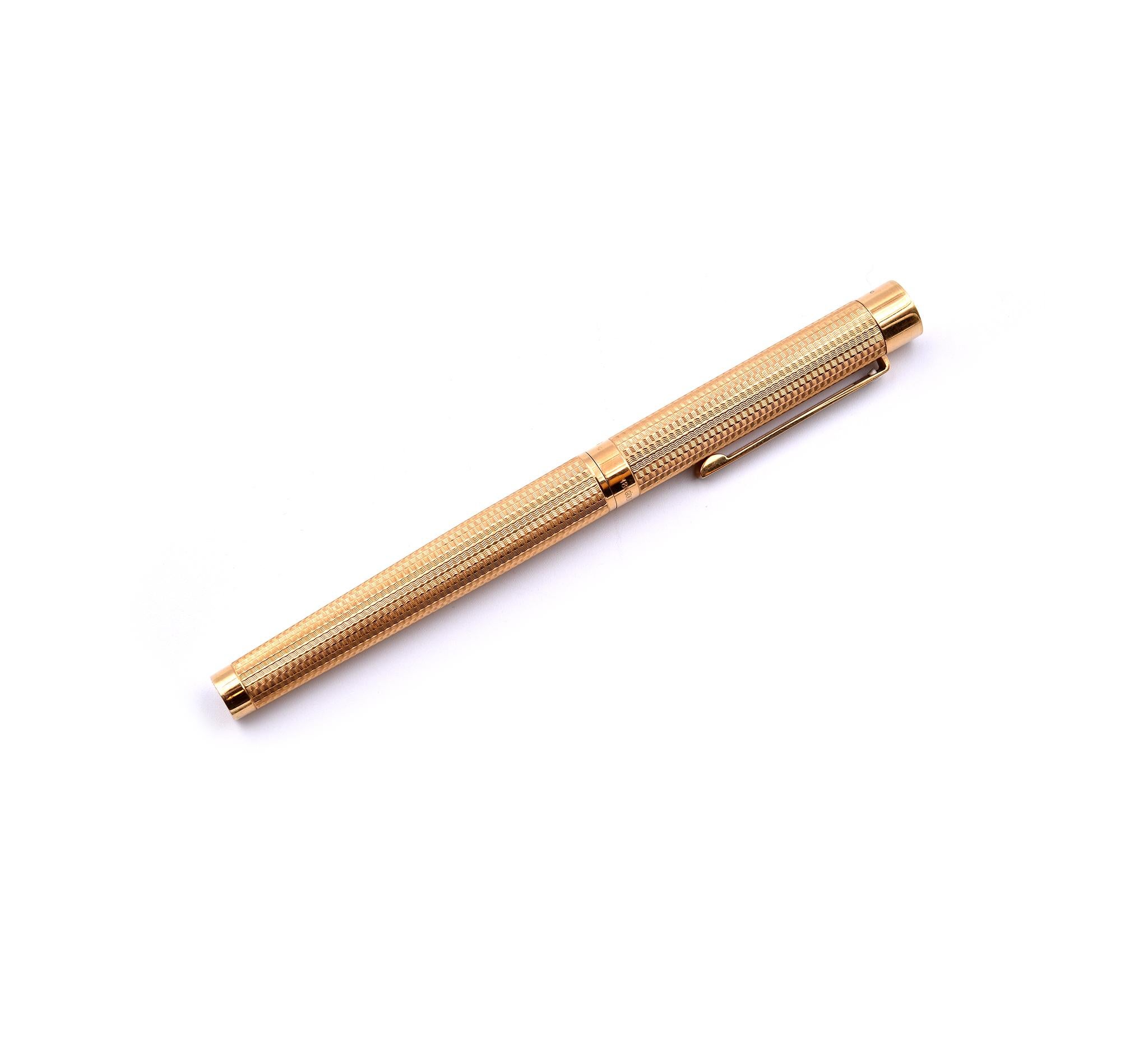 Designer: Sheaffer
Material: 18k Yellow Gold
Dimensions: pen measures 5 ½ -inches long
Weight: 33.8 grams

Comes with Box and Warranty Card
