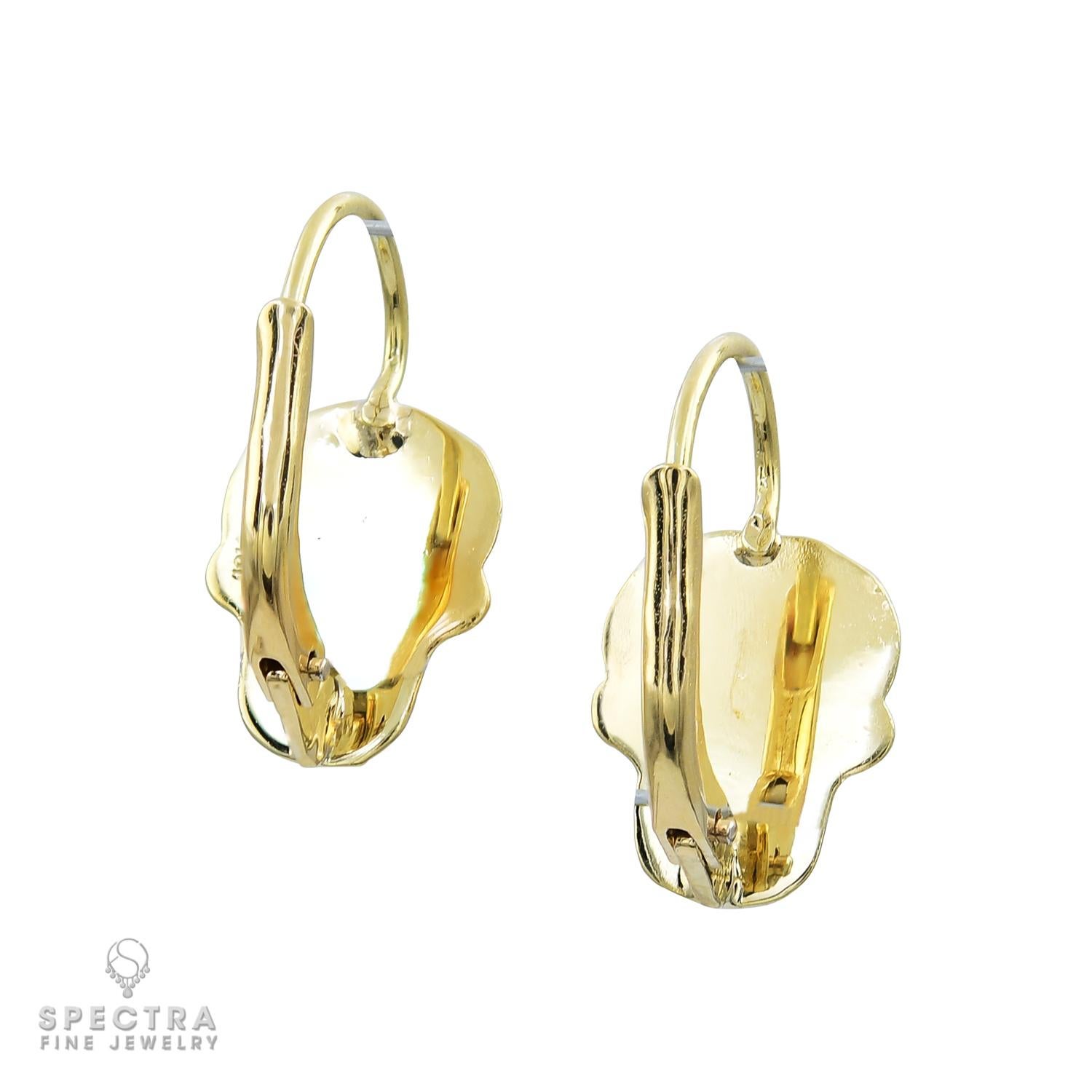 Contemporary 18k Yellow Gold Skull Motif Earrings with Diamonds For Sale