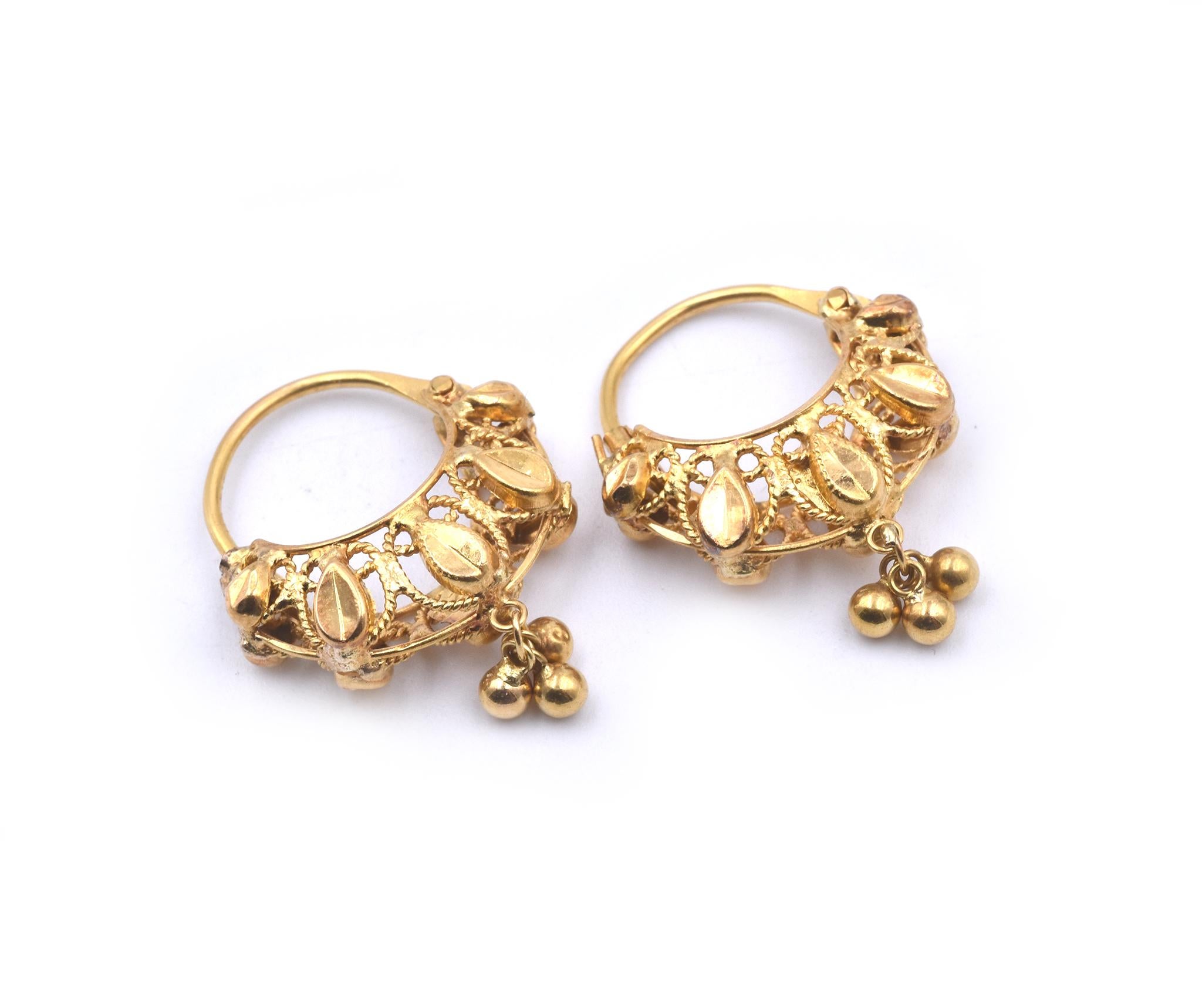 Designer: custom 
Material: 18k yellow gold
Dimensions: the earrings measure 1 inch in length & ¾ of an inch in width
Weight:  4.97 grams