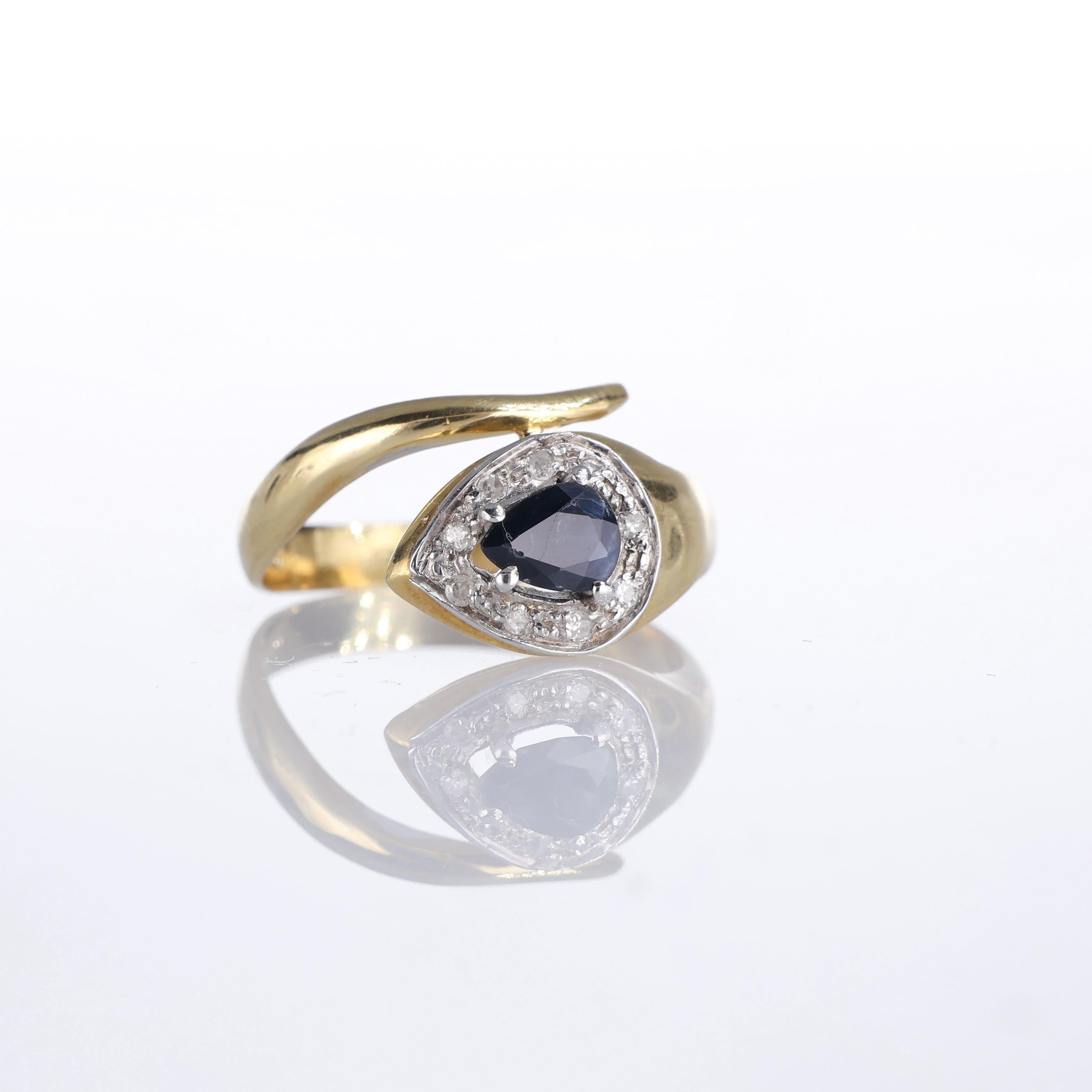 IMPORTANT NOTE:
✔ No additional costs will be added to this order.
✔ Shipping and customs duties are fully covered by us.
--------------------
An exquisite 18k yellow gold snake-inspired ring featuring a captivating pear-cut sapphire at its center,