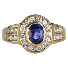 18K Yellow Gold Solitaire Ring with Oval Sapphire and Diamonds
