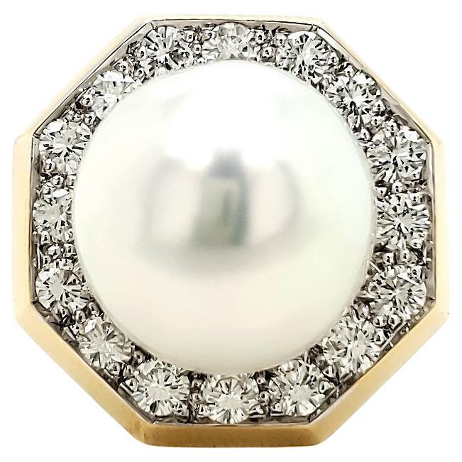 Shine Bright! This 18k Yellow Gold South Sea Pearl Diamond Ring is a showstopper.

At its heart lies a magnificent South Sea pearl, a pristine sphere of nature measuring 13.50mm. 

The lustrous pearl takes center stage, exuding a sense of refinement