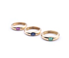 18 Karat Yellow Gold Stackable Emerald, Ruby, and Sapphire Band Set