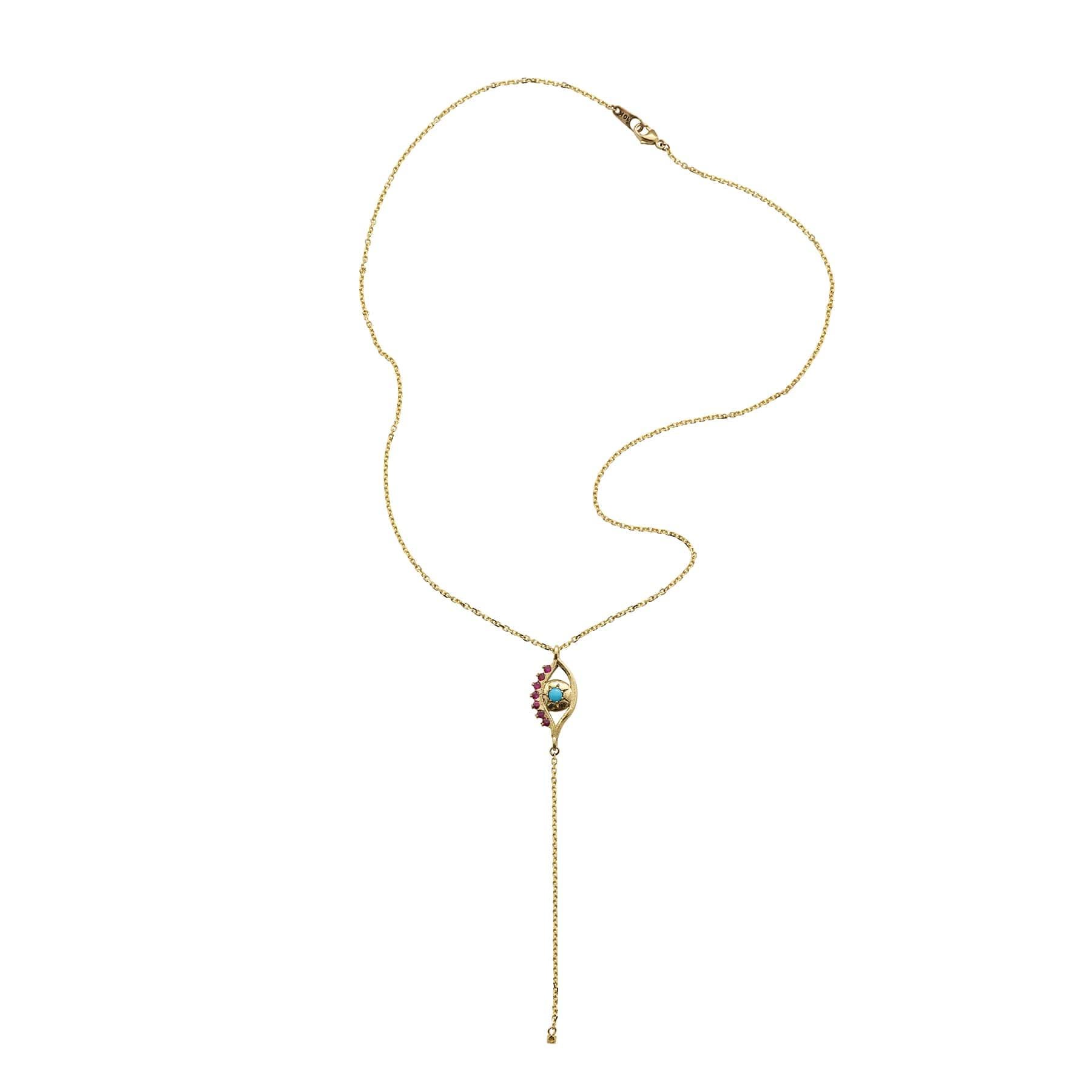 Full of talismanic power, our 18k yellow gold evil eye is centered by a cabochon turquoise gemstone encircled by the engraving of a 7-pointed star. A row of brilliant-cut rubies creates the upper lashes.  To make this ancient symbol more modern, a
