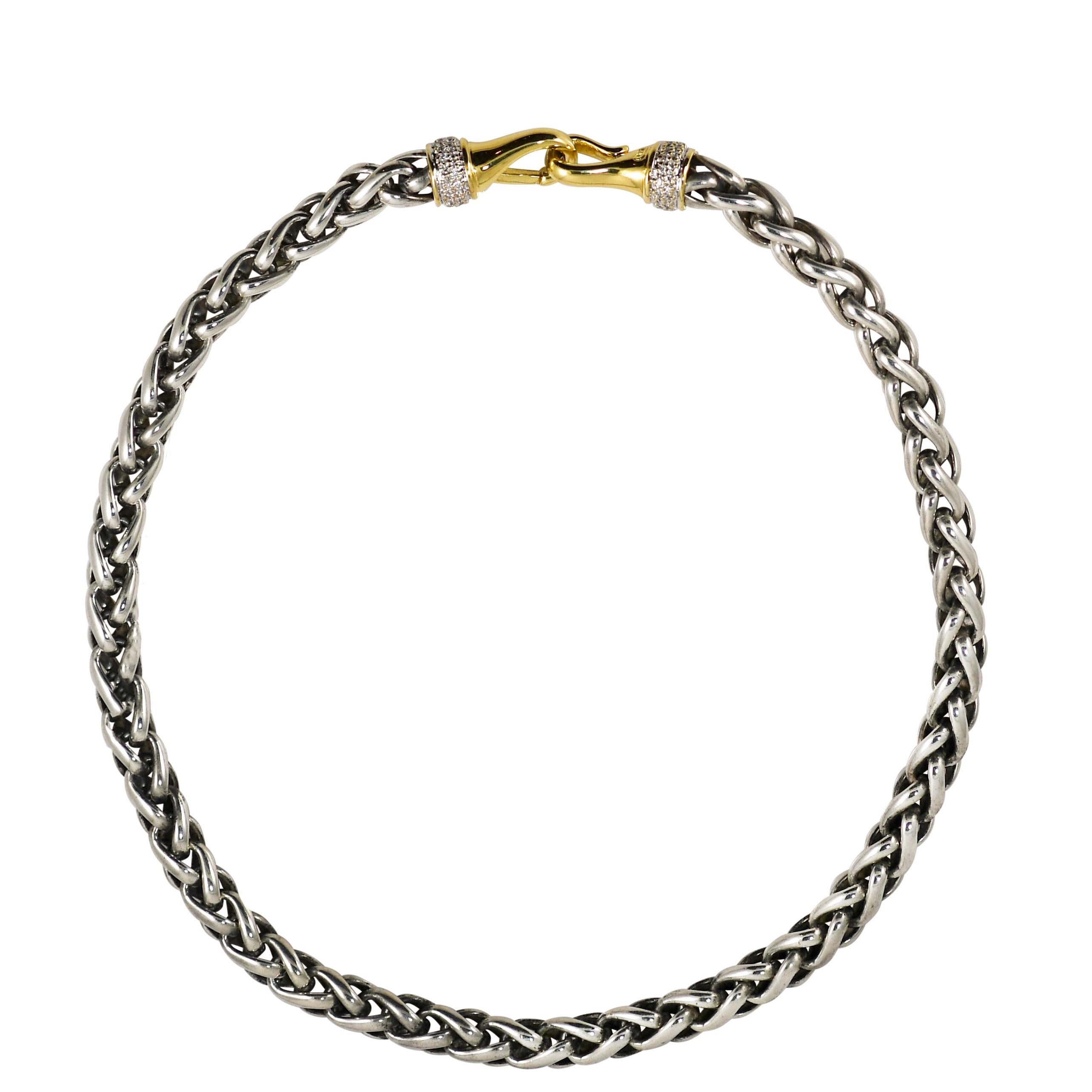 18k Yellow Gold, Sterling Silver, & Diamond David Yurman Necklace, .50tdw

David Yurman sterling silver, 18k yellow gold and diamond necklace.
Stamped D.Y., .925,.750 and weighs 97 grams.
The large clasps are 18k gold with diamonds around the