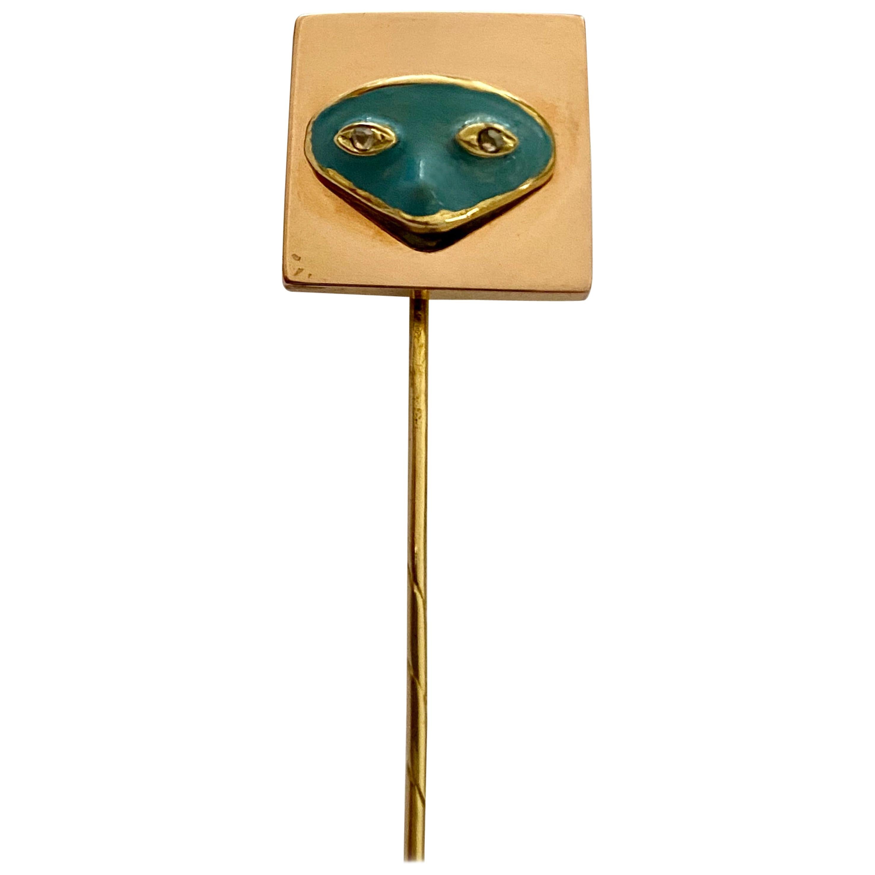 18 Karat Yellow Gold Stickpin with an Enamel Mask, England, 1900 For Sale