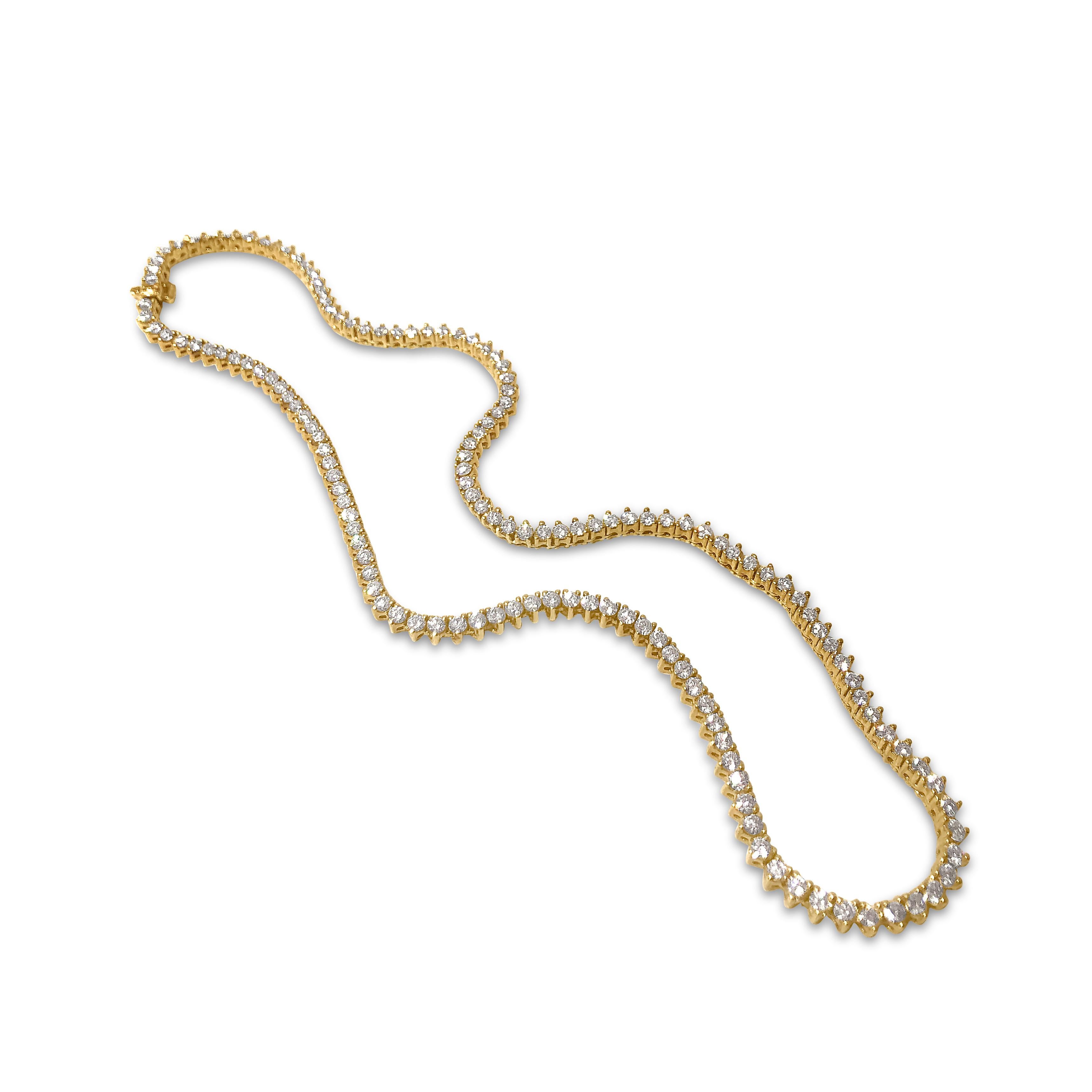 Our 18K yellow gold and diamond necklace is a bonafide show-stopper. This straight line necklace features 143 round 2.7mm diamonds, totaling 11.70ct, with a secure closure.

Specifications:
- Stone(s): Diamonds
- Diamond-Cut & Clarity:  11.70ct.