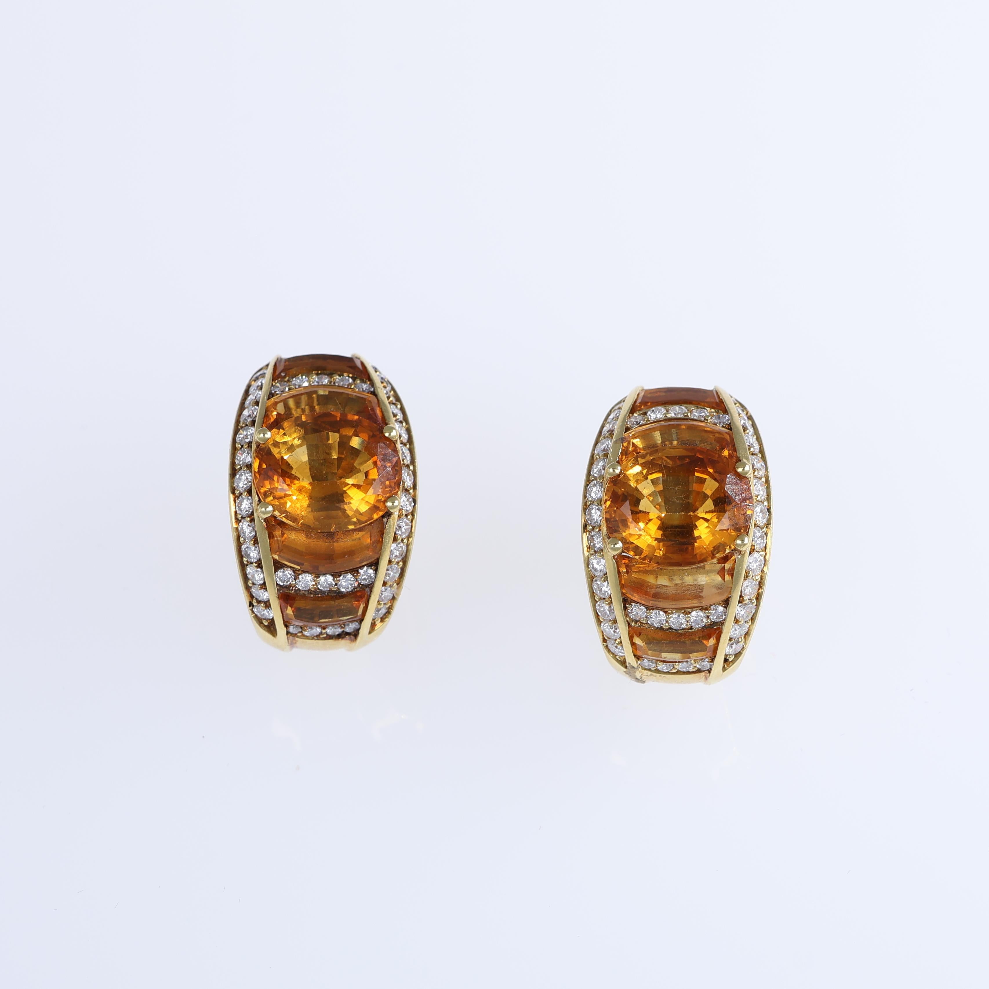 These elegant 18K yellow gold stud earrings showcase two stunning citrine topaz gemstones, totaling 8.90 carats, set at the center of a sleek and sophisticated design. Framed by rows of brilliant-cut natural white diamonds, these earrings radiate