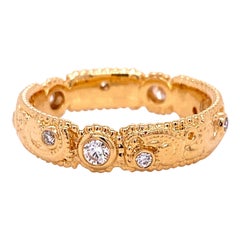 Bracelet en or jaune 18 carats avec diamants à motif tourbillon