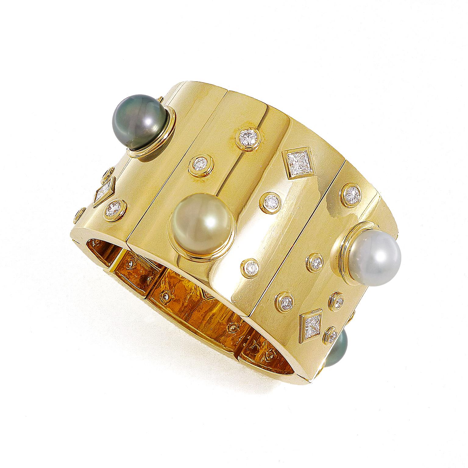 Lustrous pearls of purple, gray, white, and yellow glimmer soft undertones are the unique accent to this panel bracelet. Scatters of glinting white light are emitted from the single and rhombus-shaped clusters of brilliant cut diamonds bezel-set