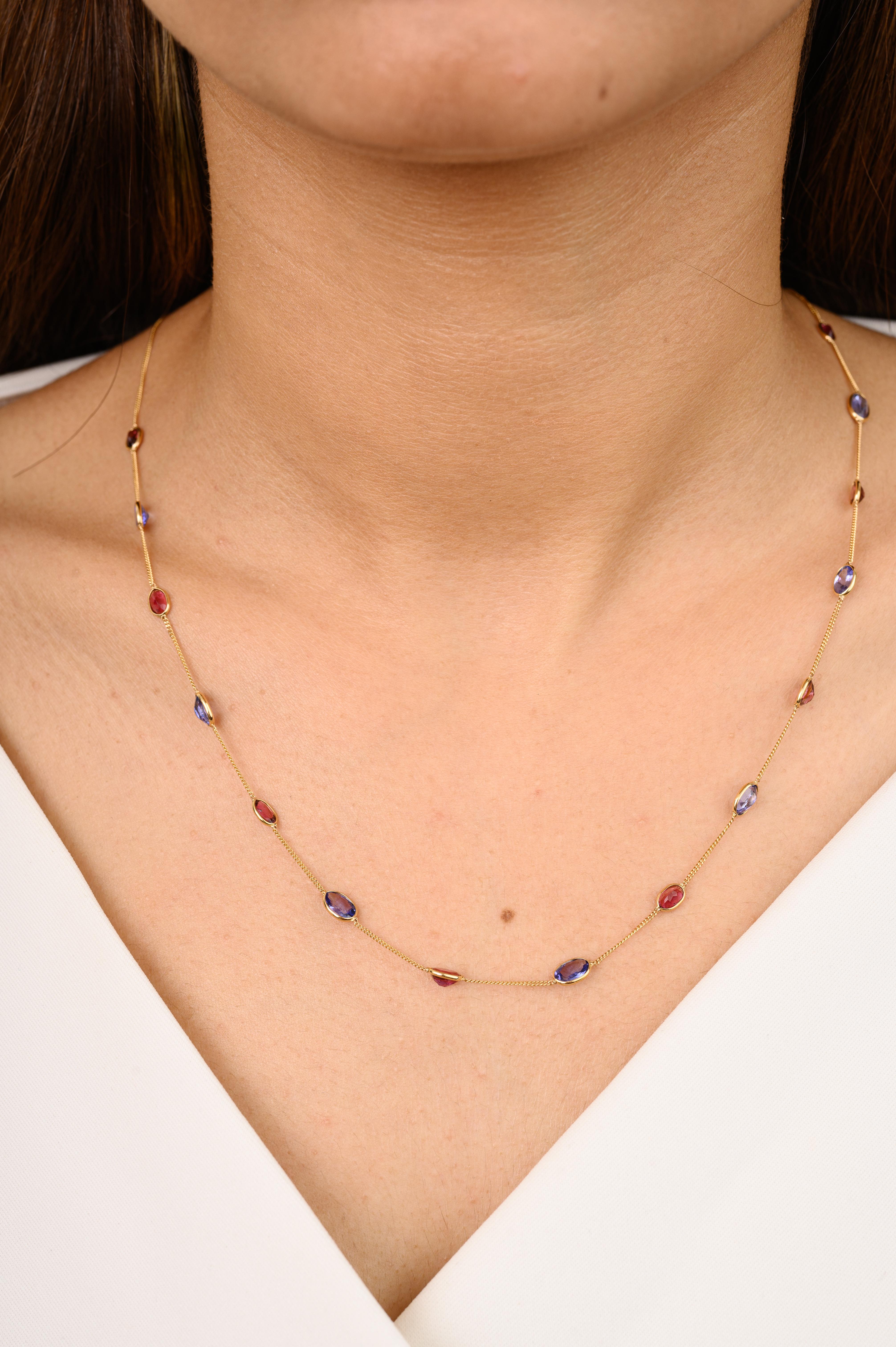 Tanzanite and Tourmaline Station Chain Necklace Gift for Women in 18K Gold studded with oval cut tourmaline and tanzanite. This stunning piece of jewelry instantly elevates a casual look or dressy outfit. 
Tanzanite brings energy, calmness and
