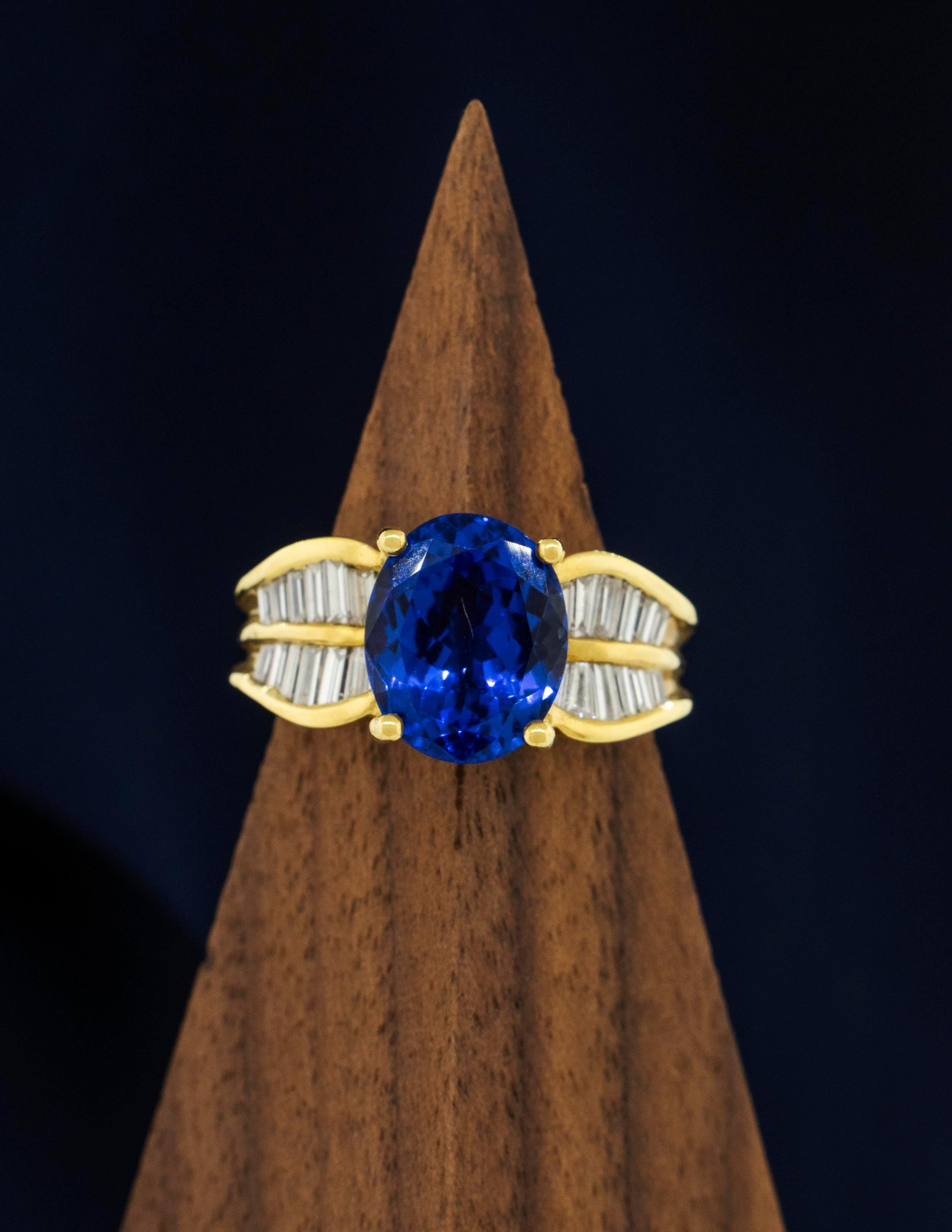 18K Yellow Gold Tanzanite Ring with Baguette Diamonds In Good Condition For Sale In Boone, NC