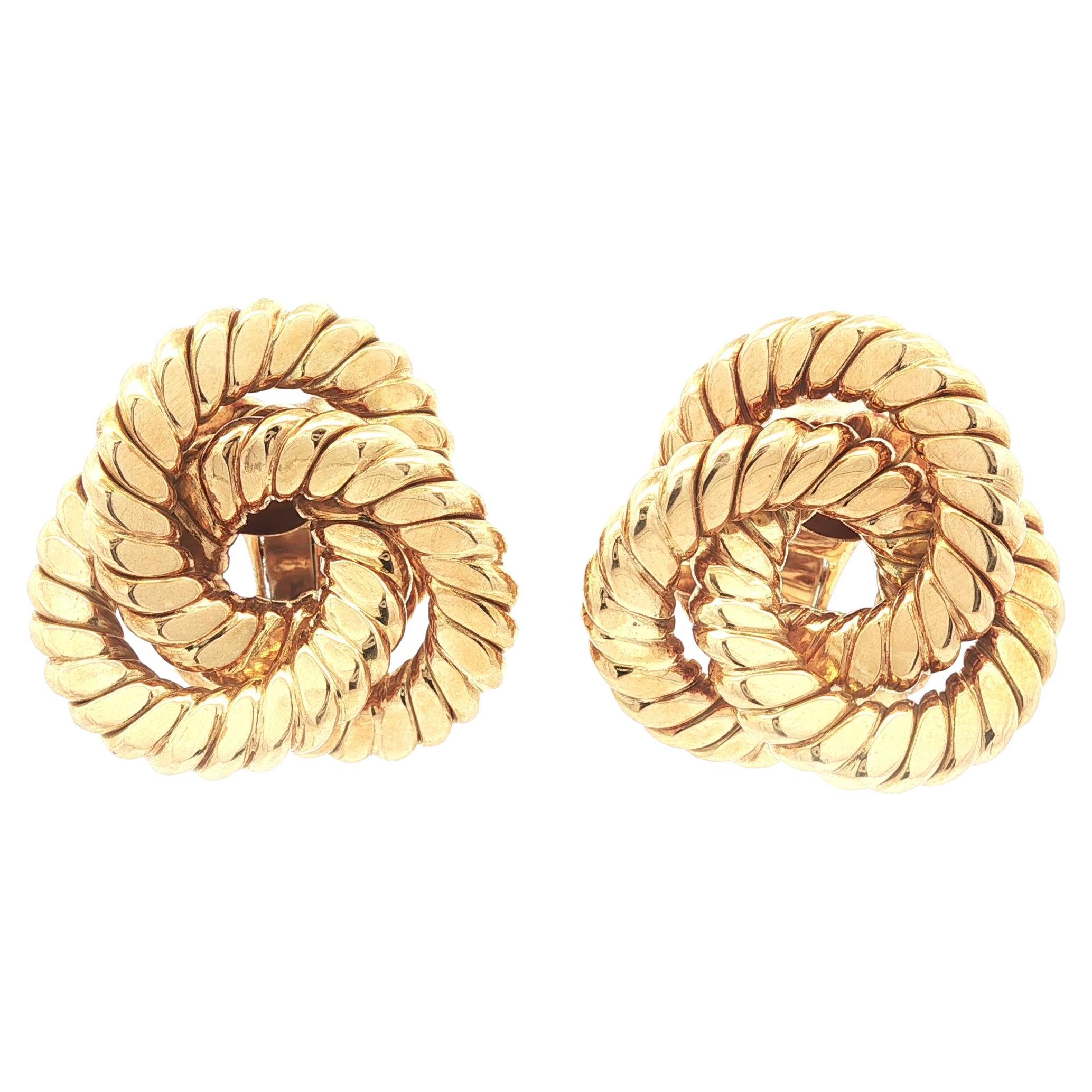 Orecchini a clip Infinity con nodo a corda piatta in oro giallo 18 carati