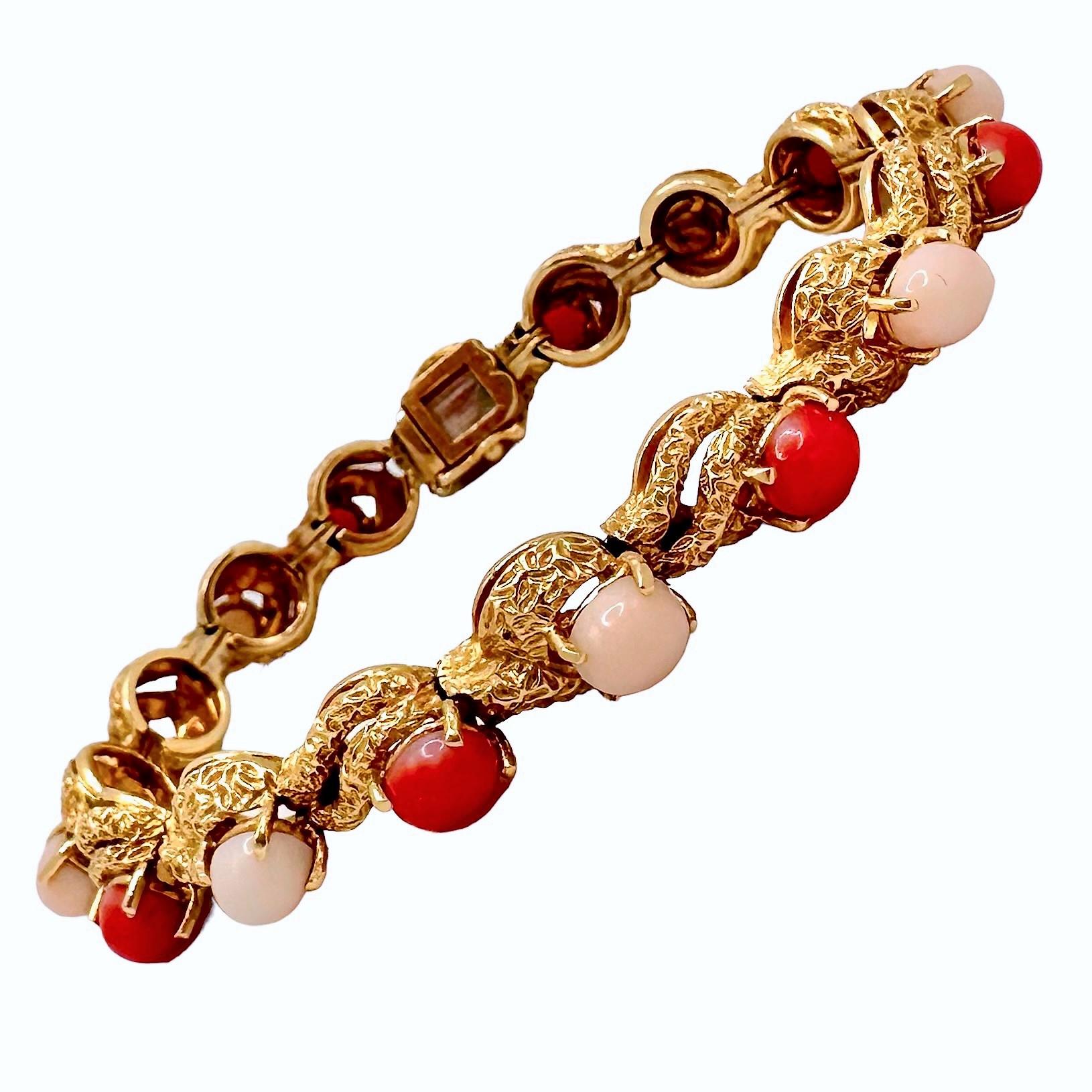 A colorful American made casual bracelet that is set with sixteen alternating bright orange and Angel Skin coral cabochons, each measuring 6mm x 5mm. This stylish bracelet has enough of a presence to stand alone, or can be stacked with other narrow
