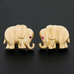 18k Yellow Gold Textured Matte Finish 3D Elephant w/ Ruby Eyes Omega Earrings