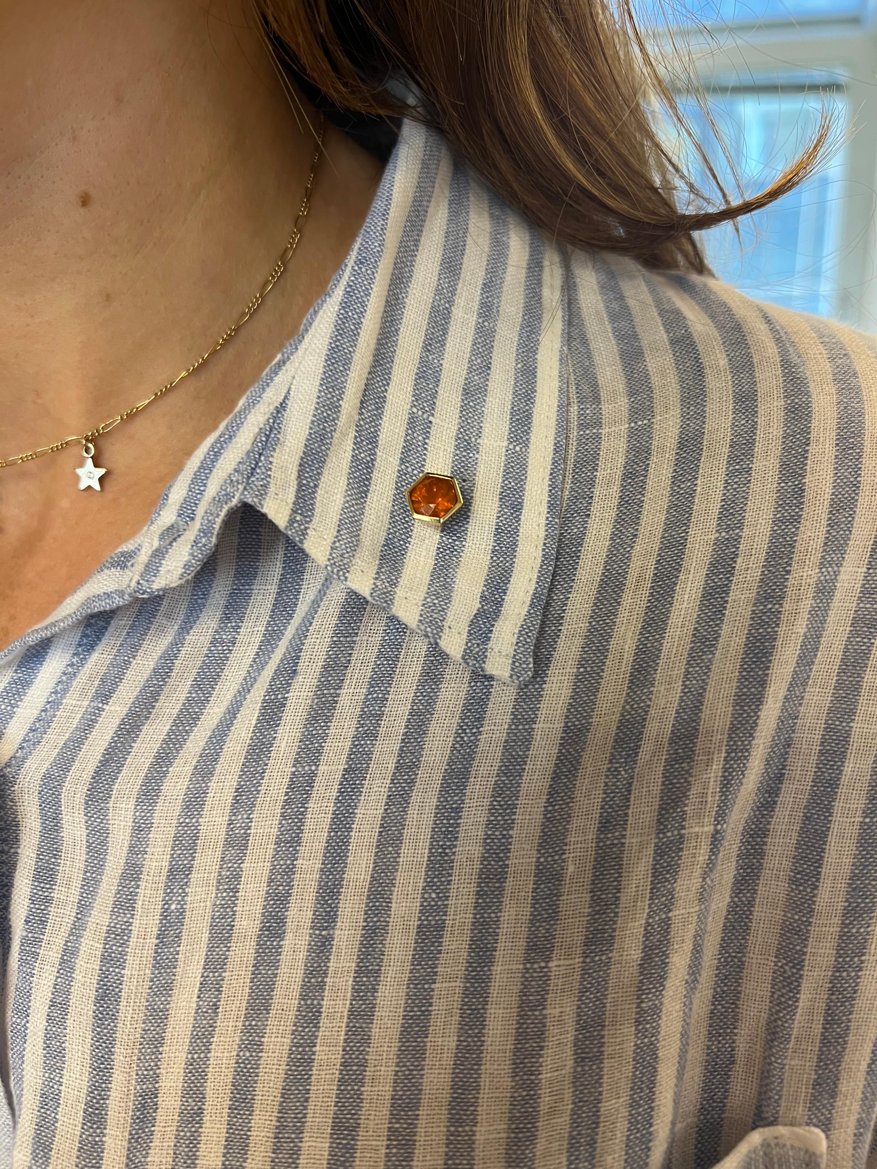 Introducing our stunning Mexican Opal Hexagonal Lapel Pin/Tie Tack, a refined accessory crafted to elevate any attire with a touch of elegance and vibrant color. This exquisite piece is meticulously fashioned from 18k yellow gold, providing a rich