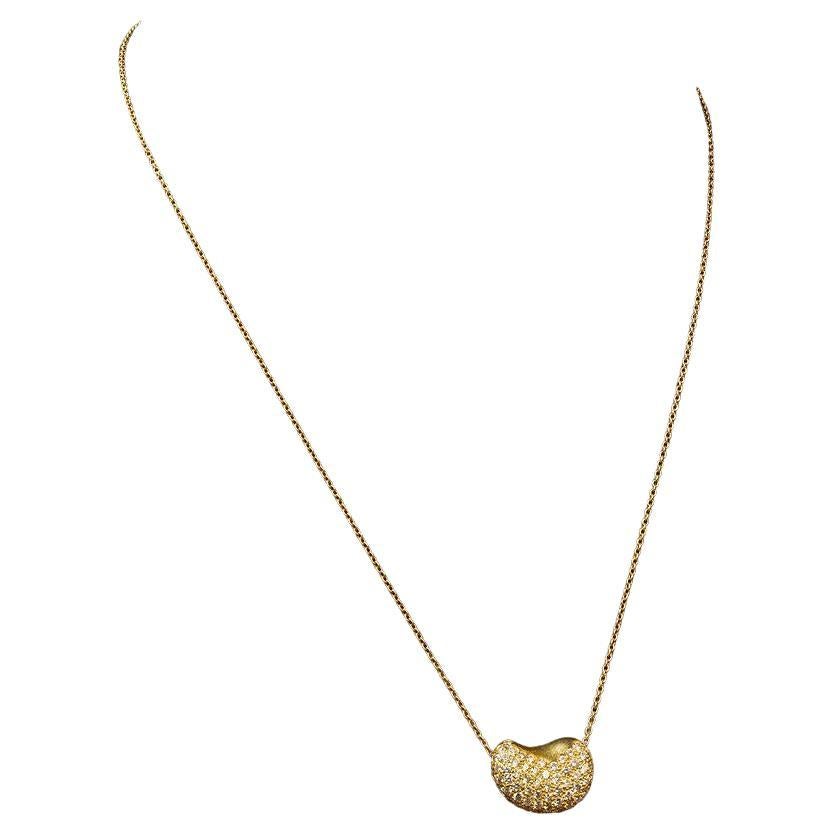 Oro giallo 18k Tiffany 
Co. Collana con fagioli diamantati Elsa Peretti Design