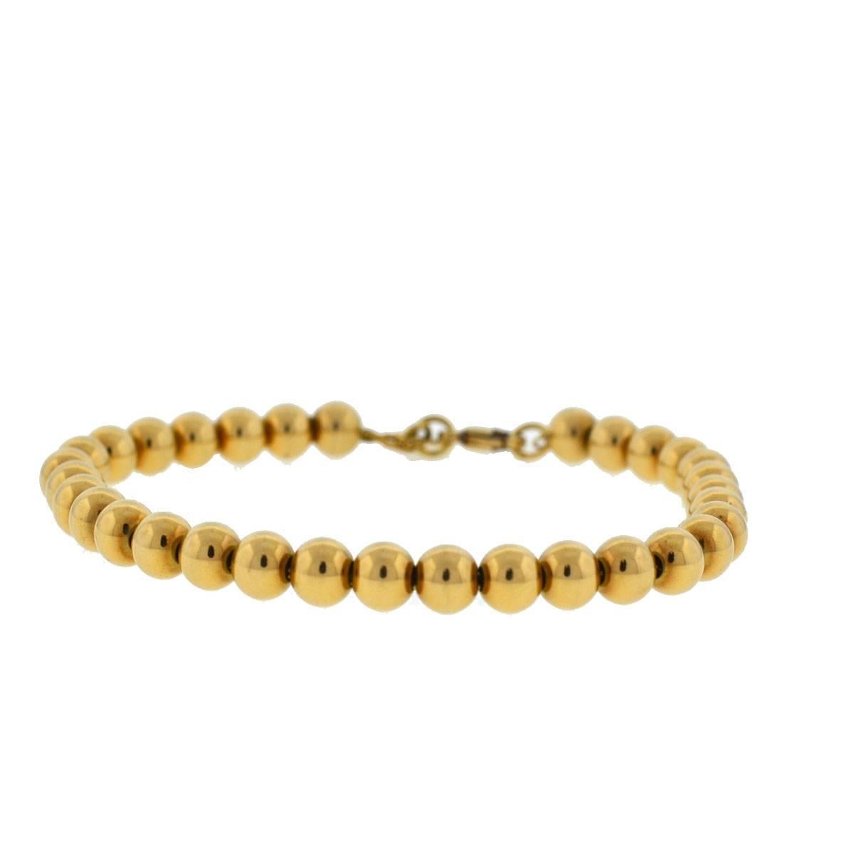 Company-Tiffany & Co.
Style-Hardware Ball Bracelet 
Metal-18k Yellow Gold 
Size / Weight-Fits a 7