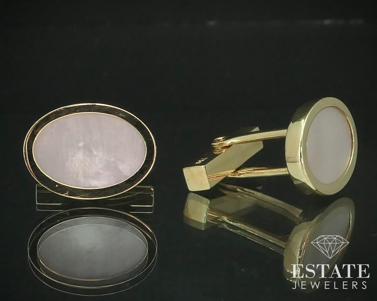 Handsome genuine oval cufflinks from Tiffany & Co with inlaid mother of pearl set on the face. 3/4