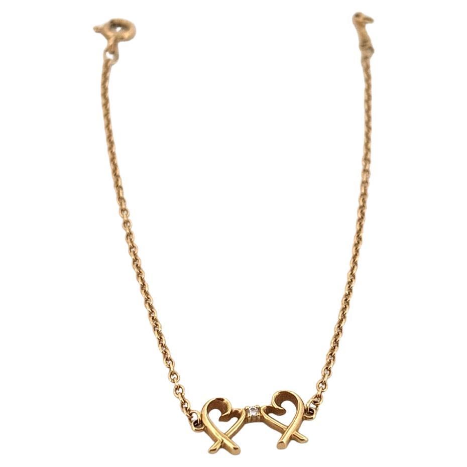 Or jaune 18K Tiffany & Co. Paloma Picasso - Bracelet à double cœur d'amour Bon état - En vente à Sewickley, PA