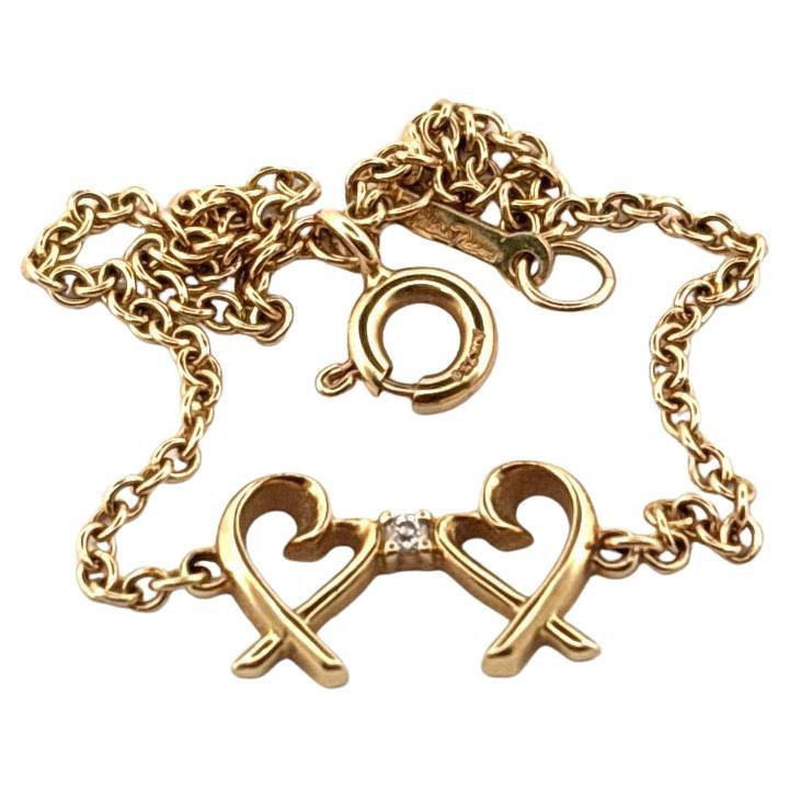 Or jaune 18K Tiffany & Co. Paloma Picasso - Bracelet à double cœur d'amour en vente 2