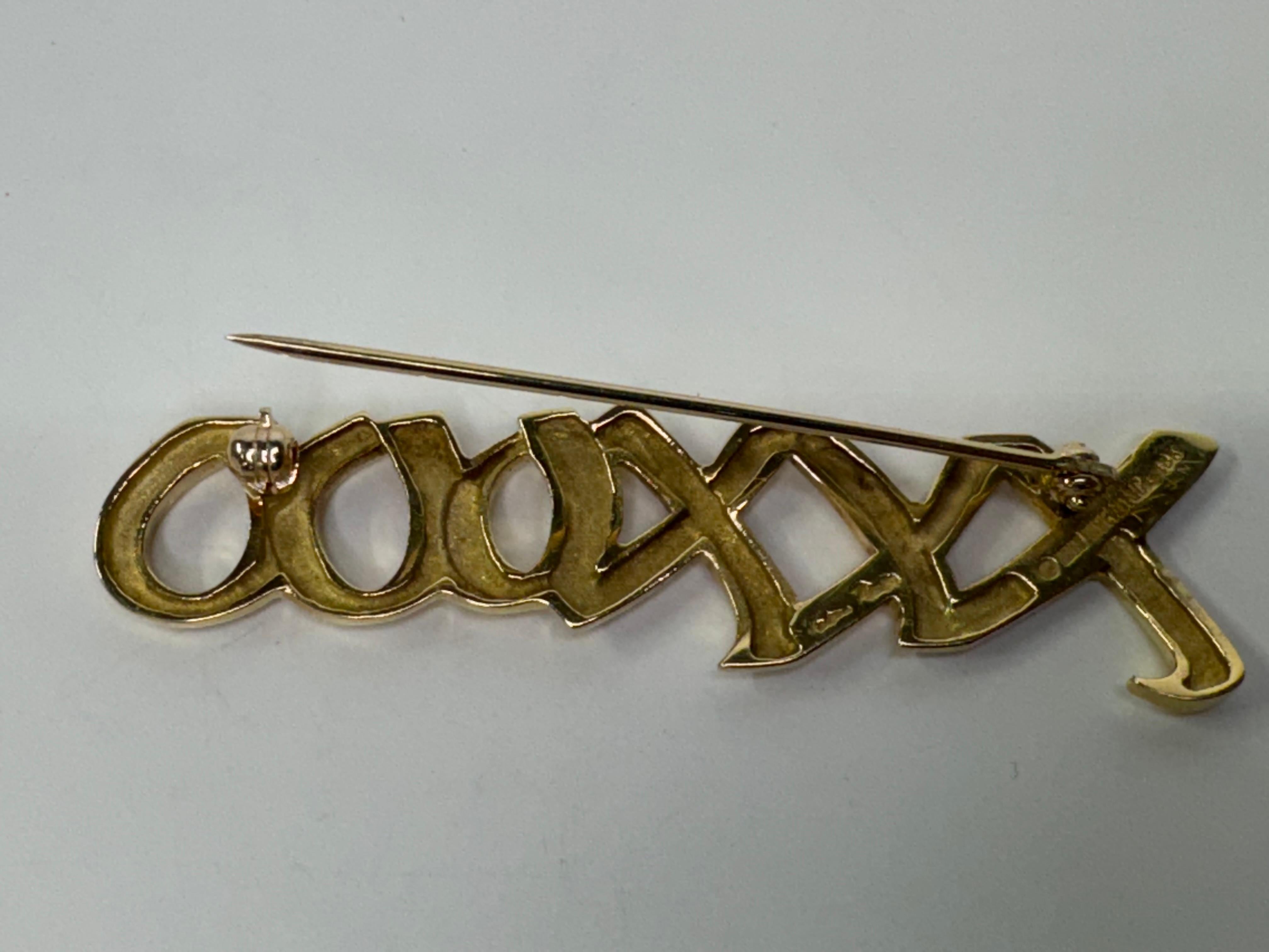 Femenino o masculino Broches Tiffany XO de oro amarillo de 18k en venta