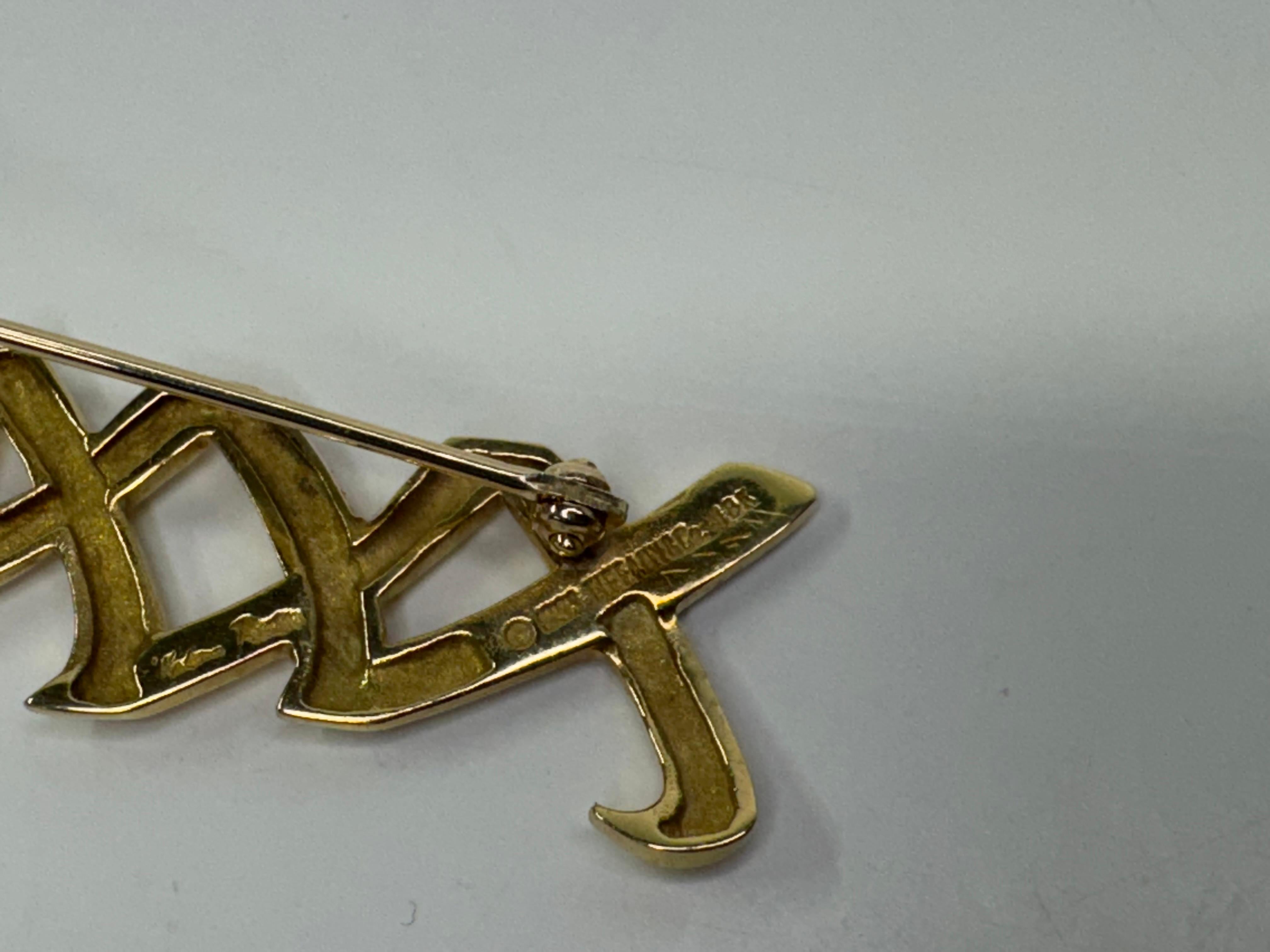Broches Tiffany XO de oro amarillo de 18k en venta 1
