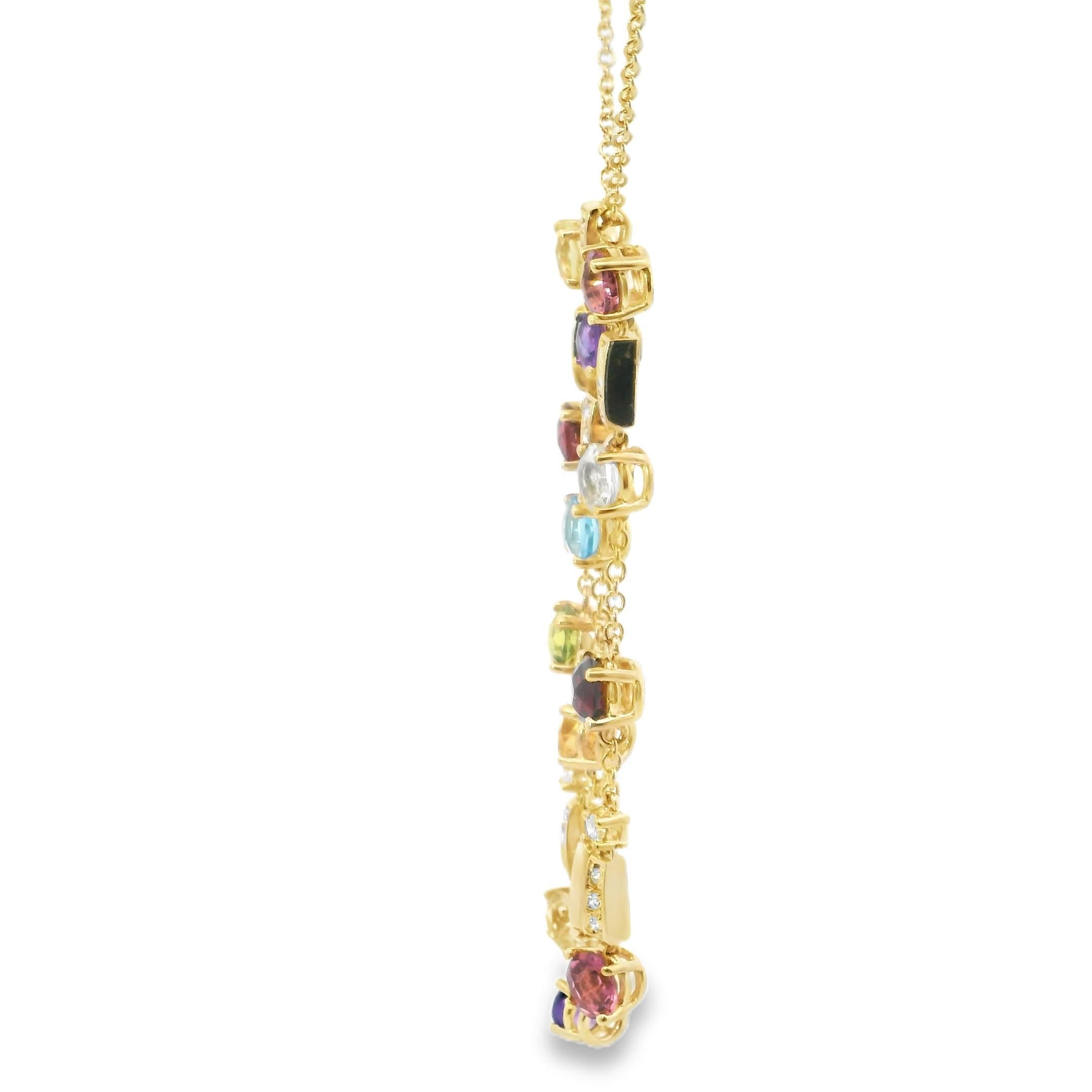 A Symphony of Color

This necklace is a vibrant cascade of hues, each gemstone a note in a harmonious melody. Crafted in 18k yellow gold, it features a dazzling array of round-cut stones, each suspended delicately on fine chains. The primary