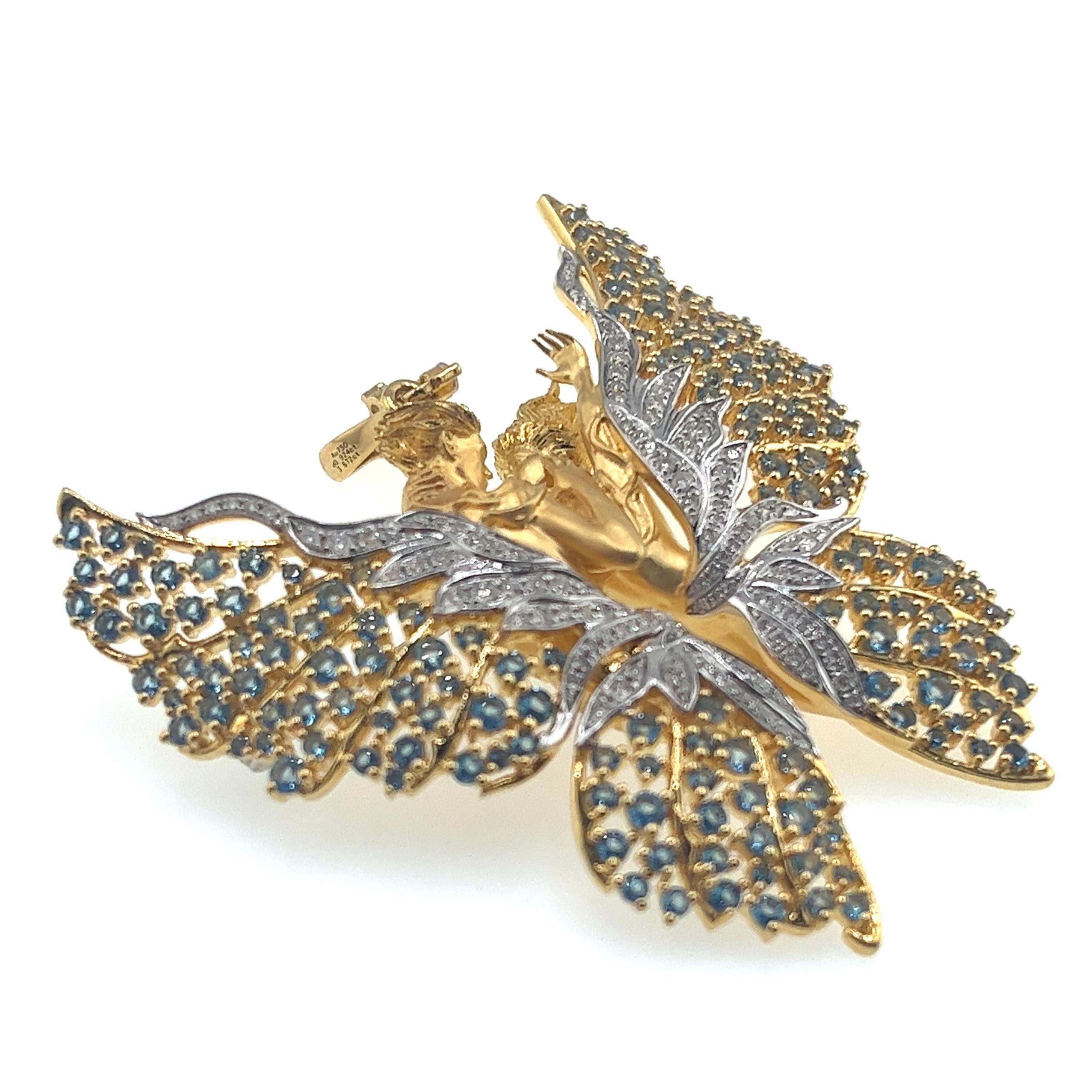 18K Yellow Gold Topaz & Natural Diamond Angel Brooch Pendant

166 Topaz - 3.872 CT
125 Diamonds - 0.927 CT
18K Gold - 26.53 GM
