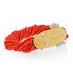18K Yellow Gold Torsade Coral Strand Fish Bracelet