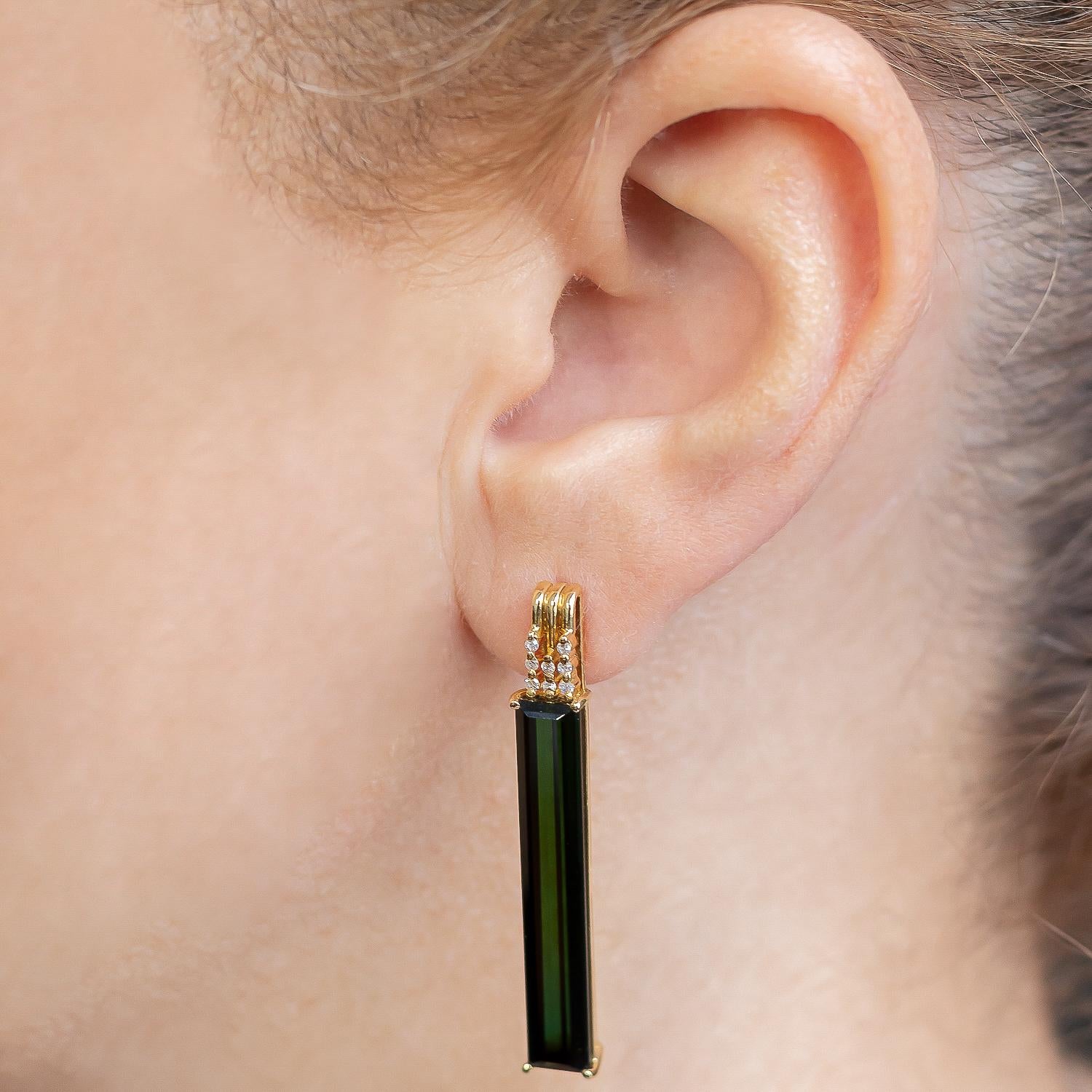 The Turmaline Earrings have been crafted with a beautiful gemstone (17.37cts) and solid 18k yellow gold (6.19grs). We have also used internationally graded VS2 diamonds with a total weight of 0.11cts.

It is a unique and versatile piece that can