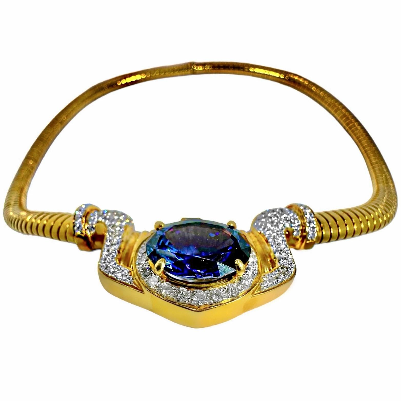 Modern 18K Yellow Gold Tubogas Necklace with Oval Tanzanite Just Under 13Ct & Diamonds For Sale